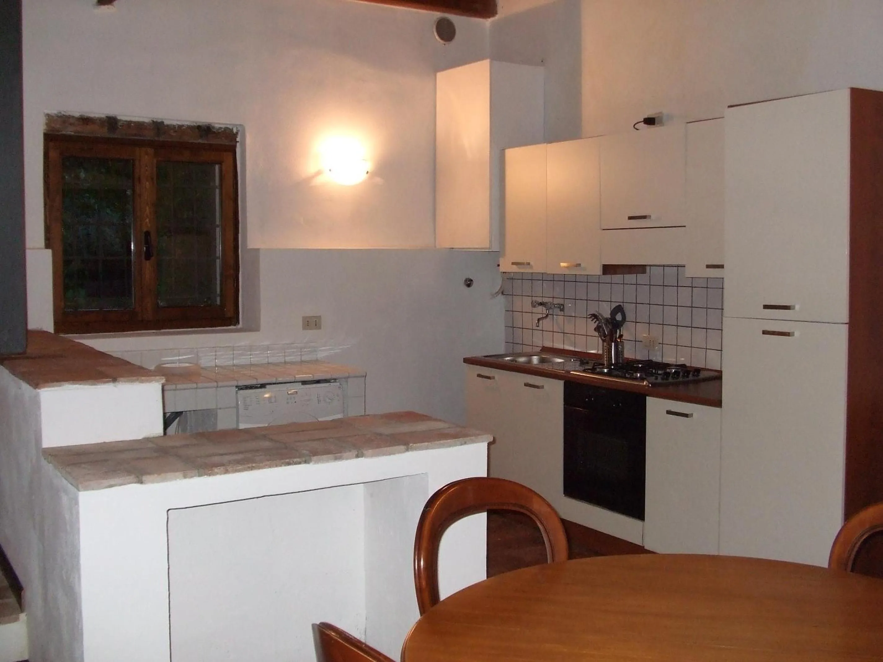 Kitchen or kitchenette in Agriturismo Cascina Rossano