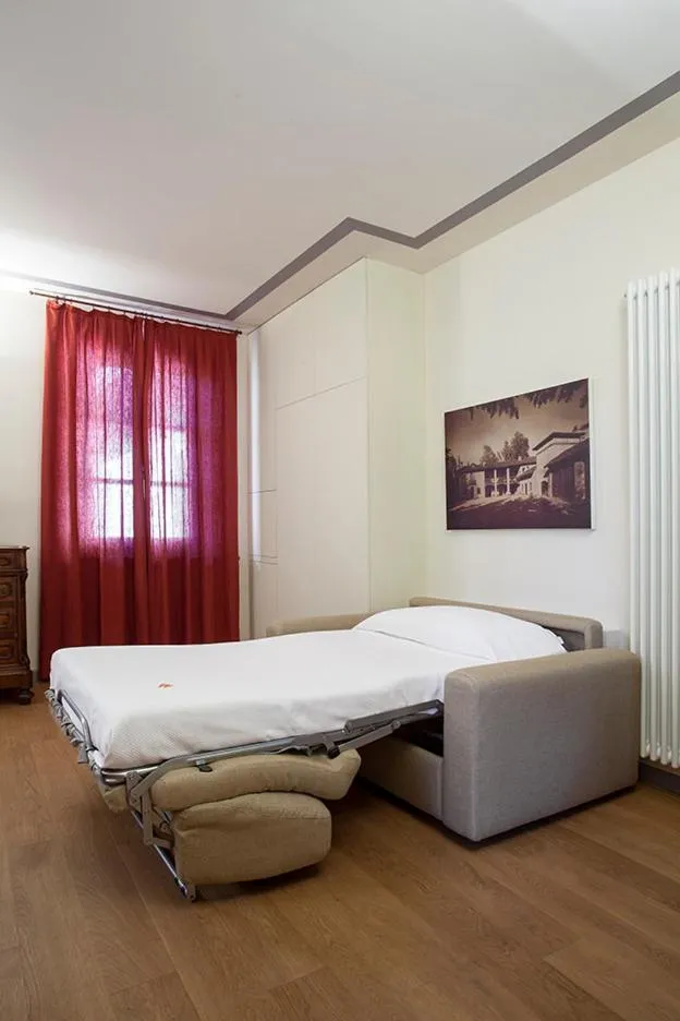 Bed in Borromeo Rooms Bed & Living