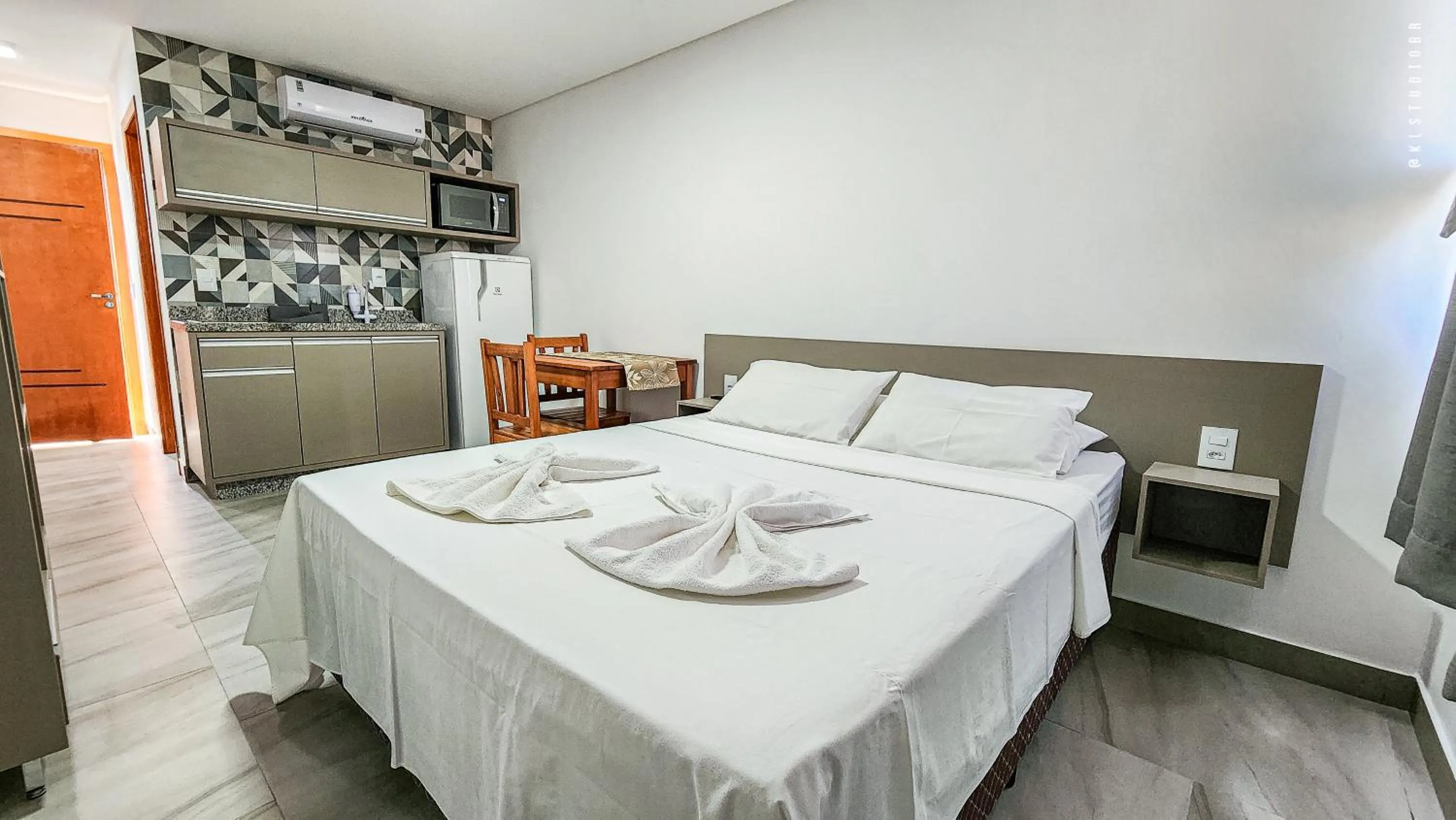 Kitchen or kitchenette, Bed in Apart Hotel Canto Grande