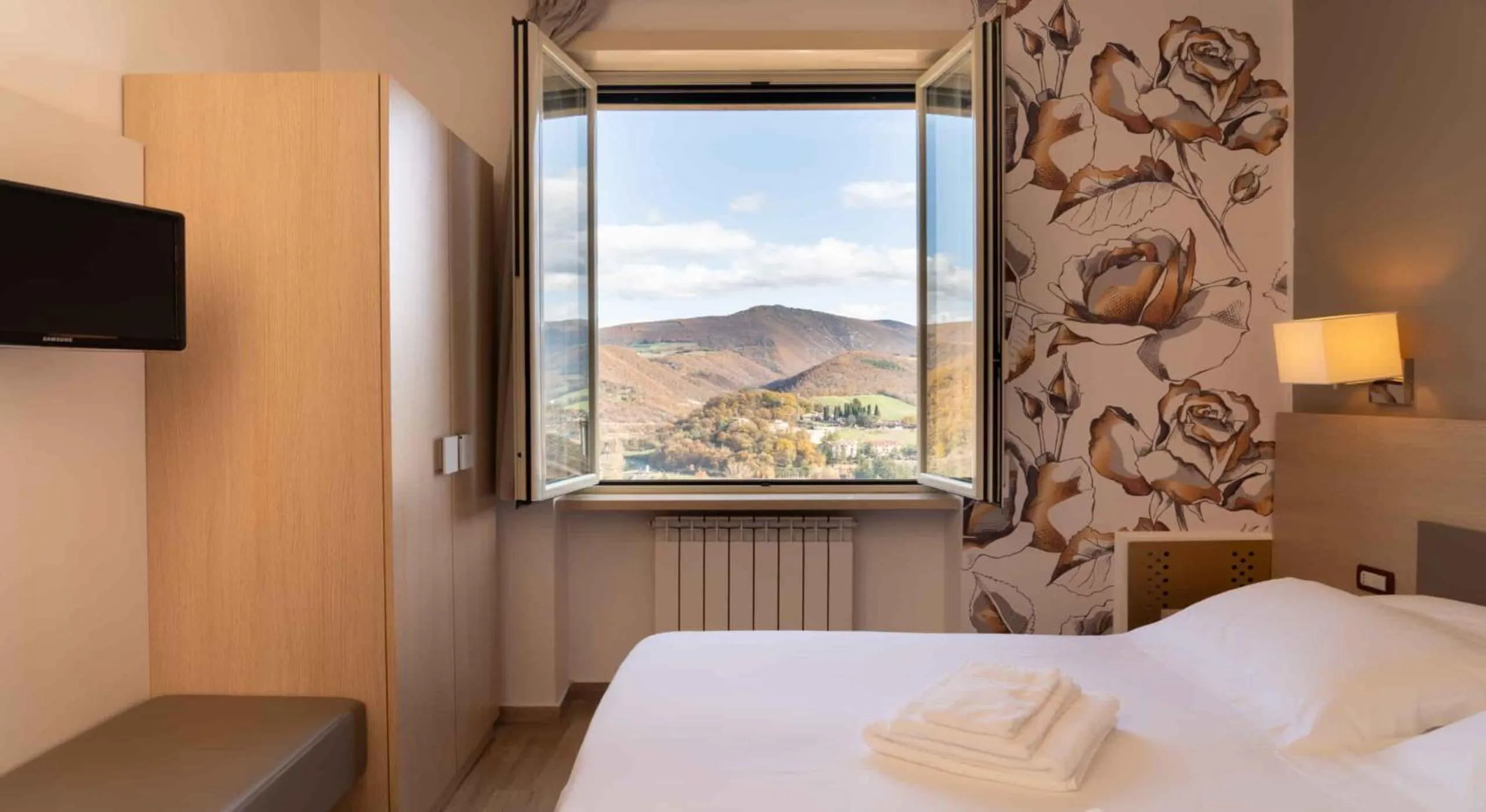 Bedroom, Bed in Hotel Delle Rose