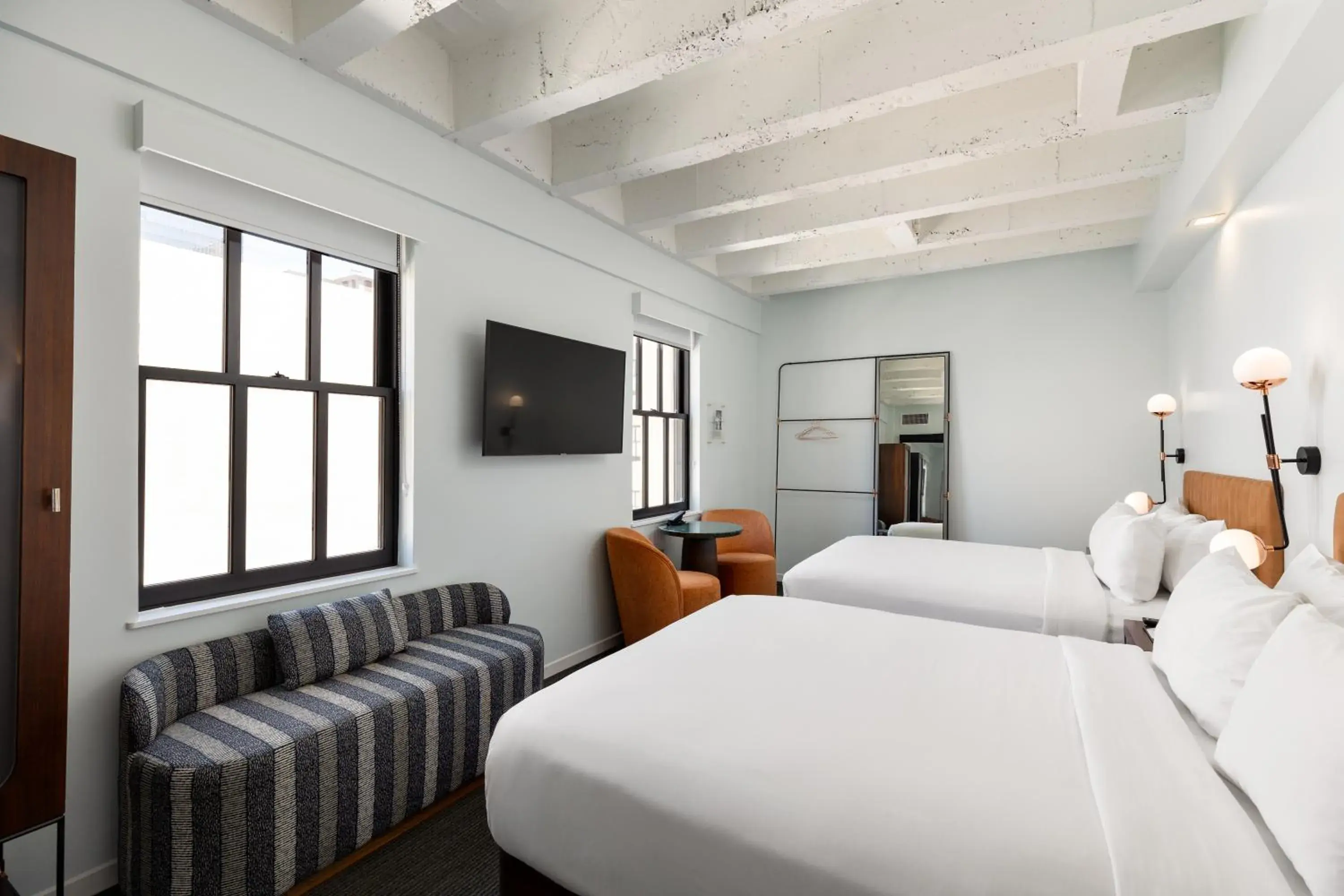 Bed in The Guild Hotel, San Diego Downtown, a Marriott Tribute Portfolio Hotel Bed in The Guild Hotel, San Diego Downtown, a Marriott Tribute Portfolio Hotel