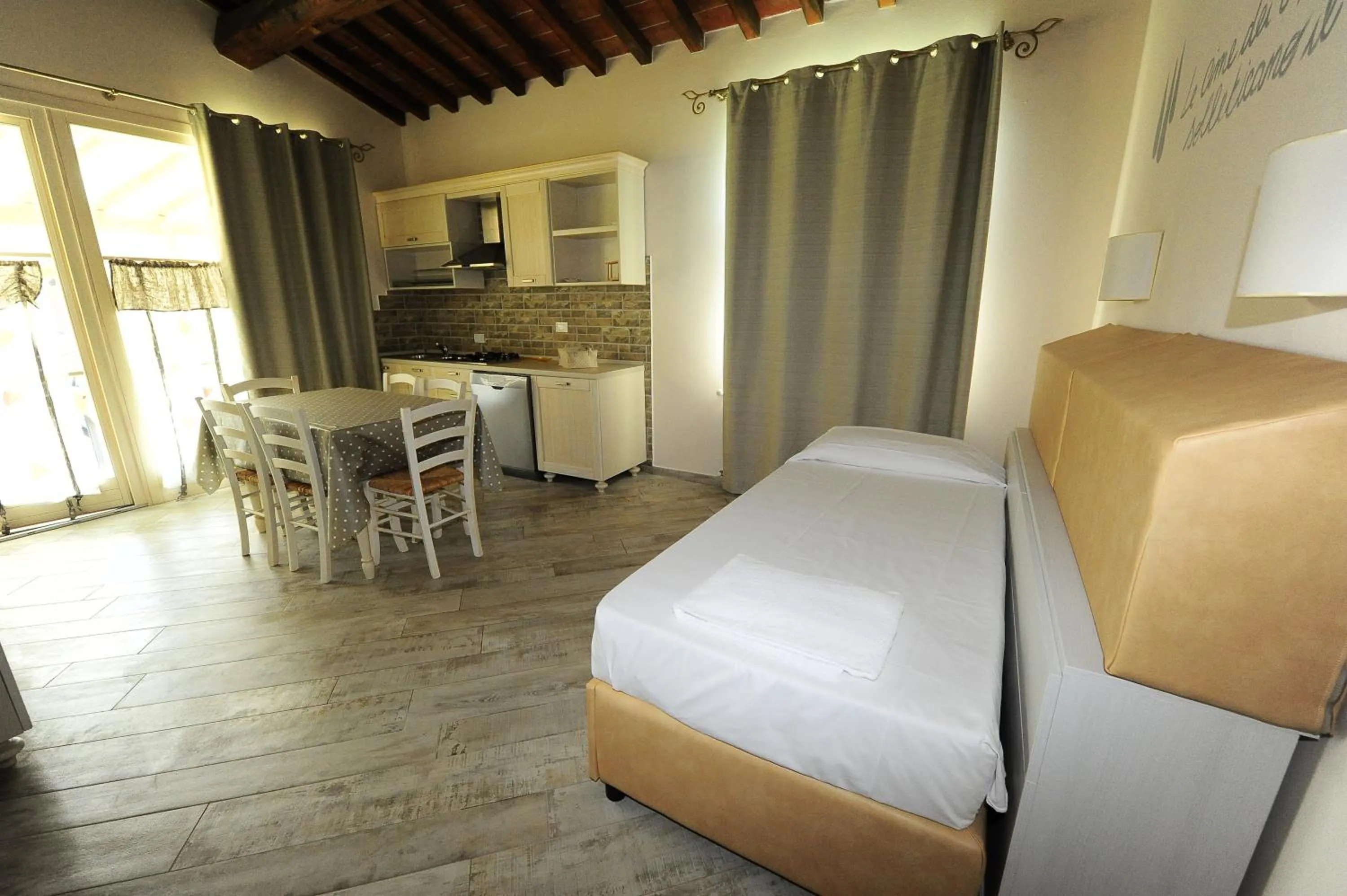 Kitchen or kitchenette, Bed in Fattoria Palazzeta - Pet & Family Friendly