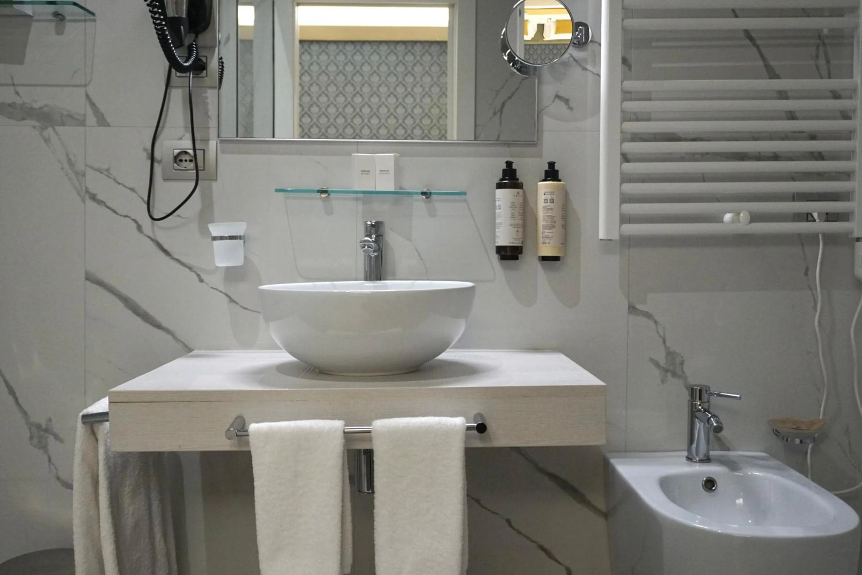 Bathroom in Hotel Caravita