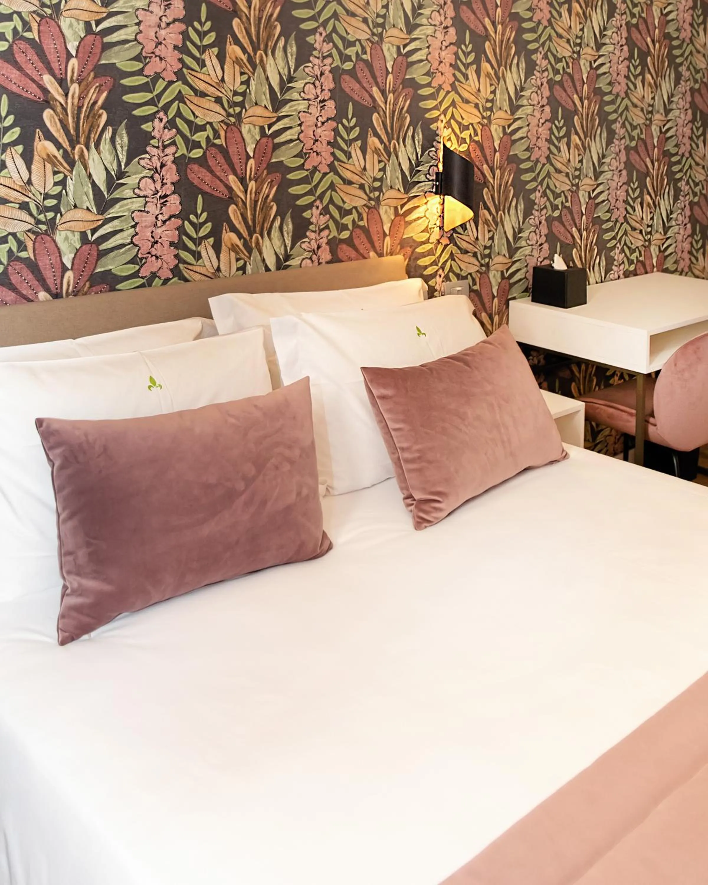 Bed in Hotel Caravita