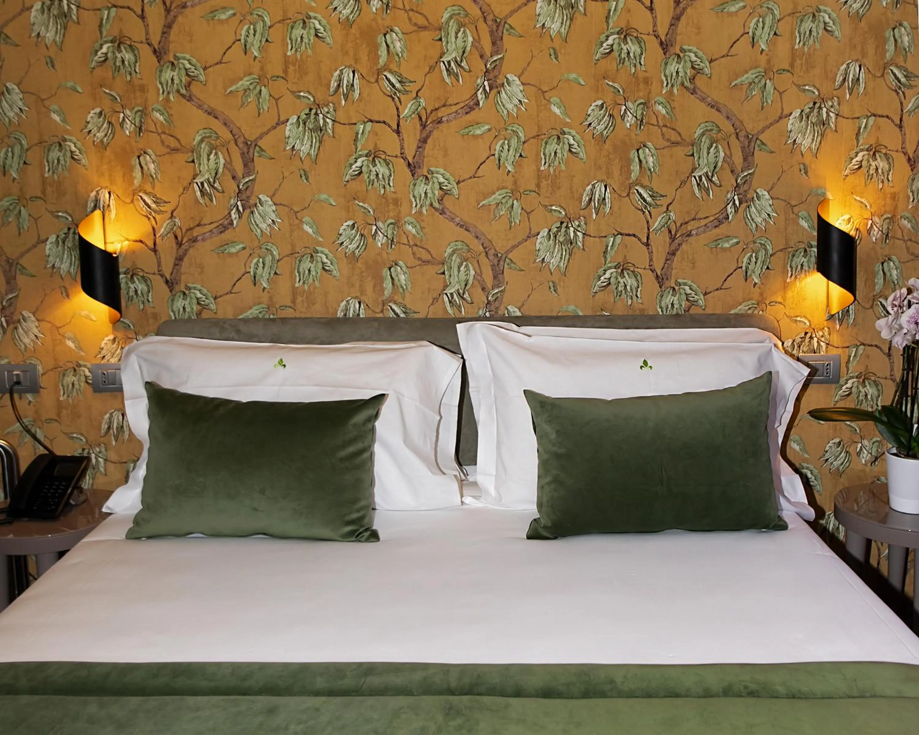 Bed in Hotel Caravita