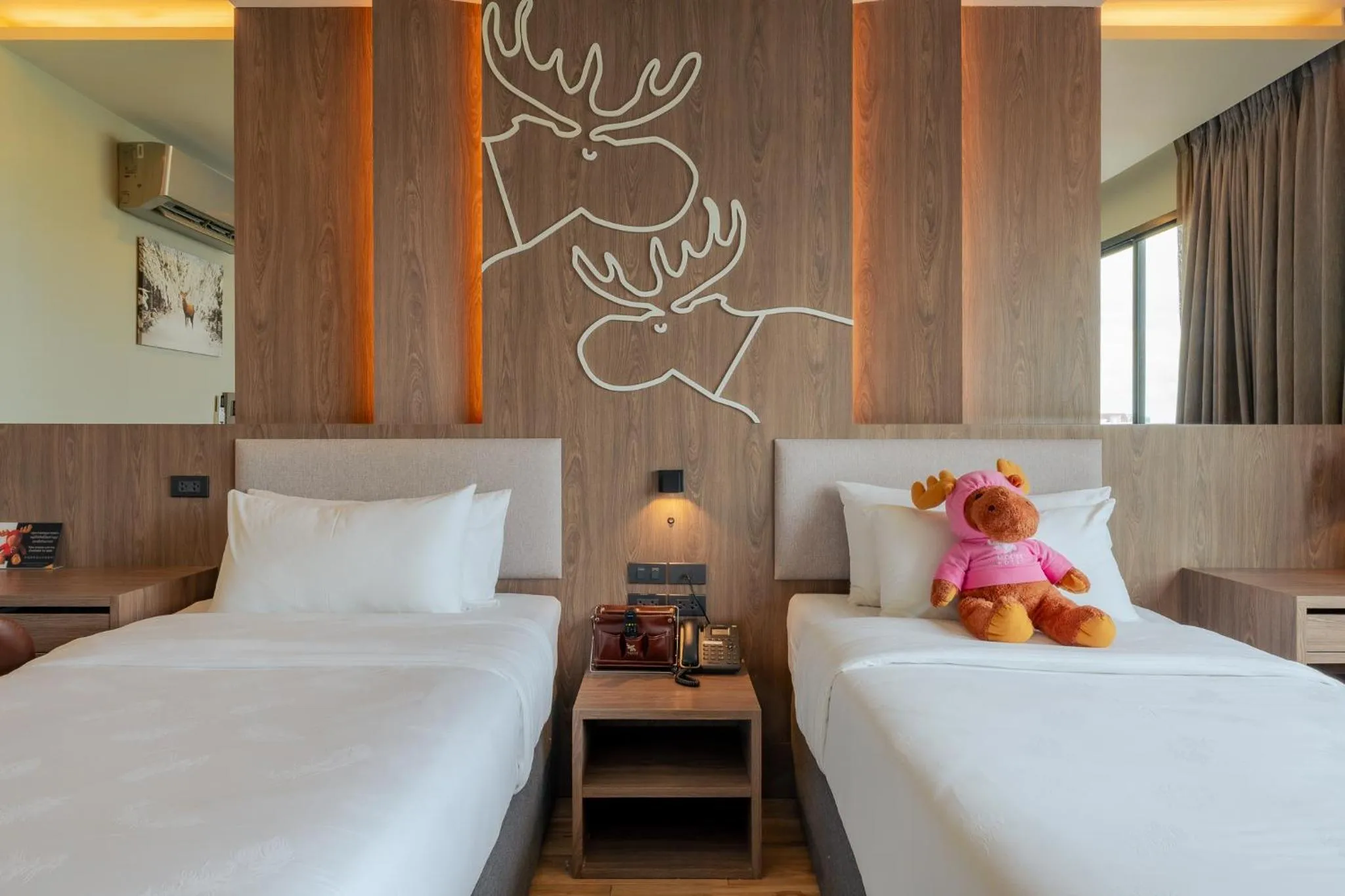Bed in Moose Hotel Chiangmai