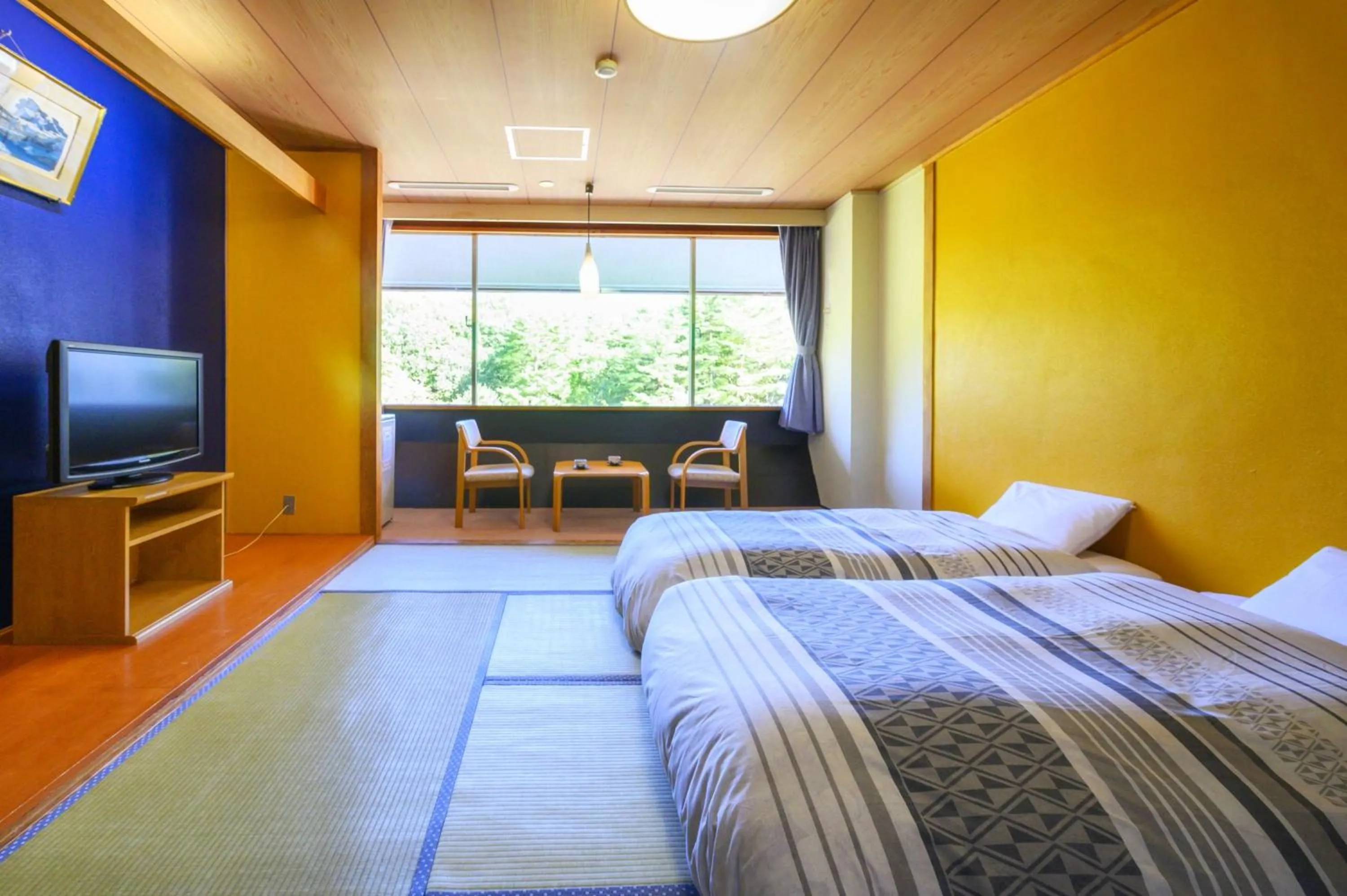 Bed in Takamiya Hotel Bonari no Mori