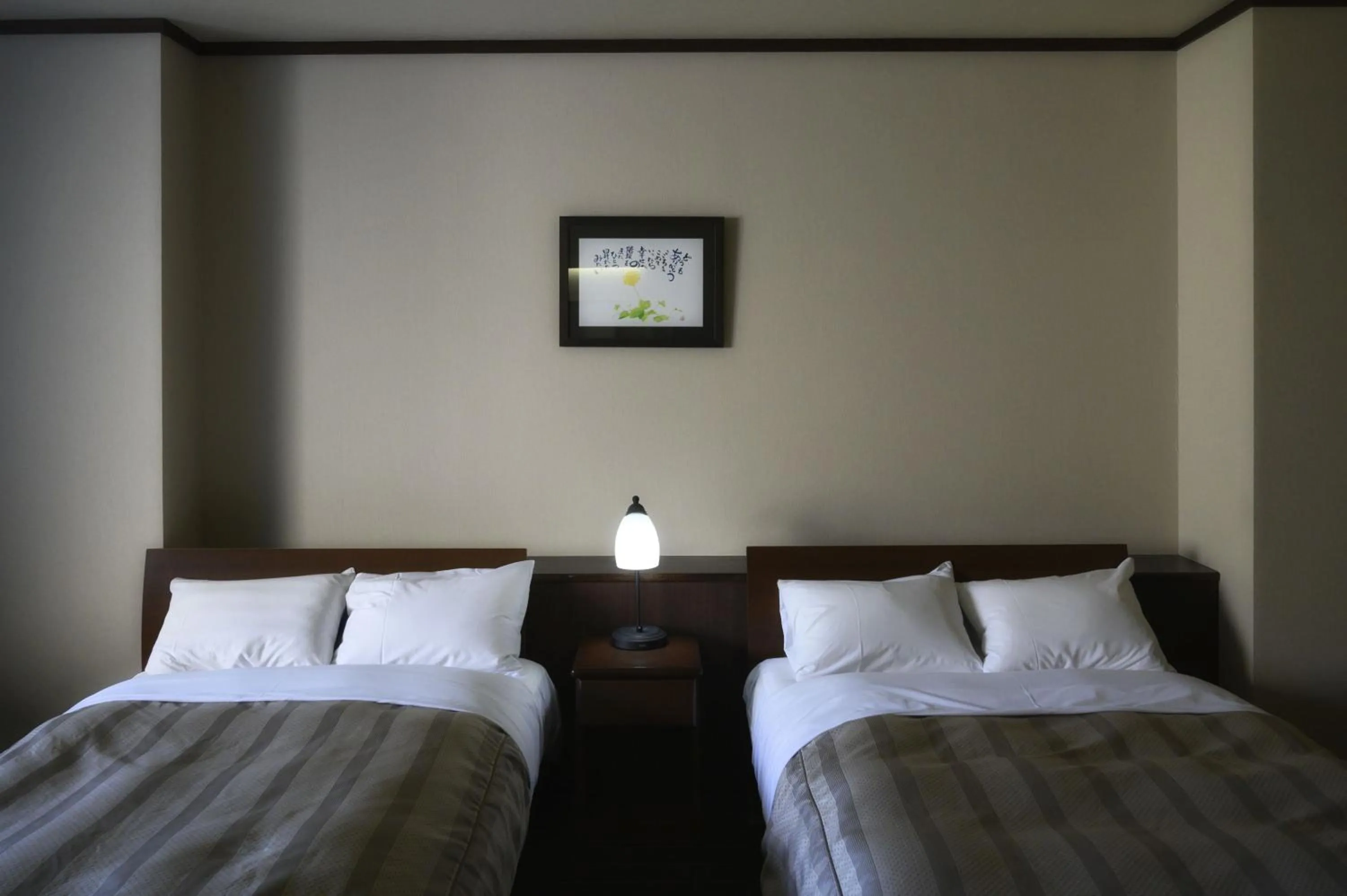 Bed in Takamiya Hotel Bonari no Mori