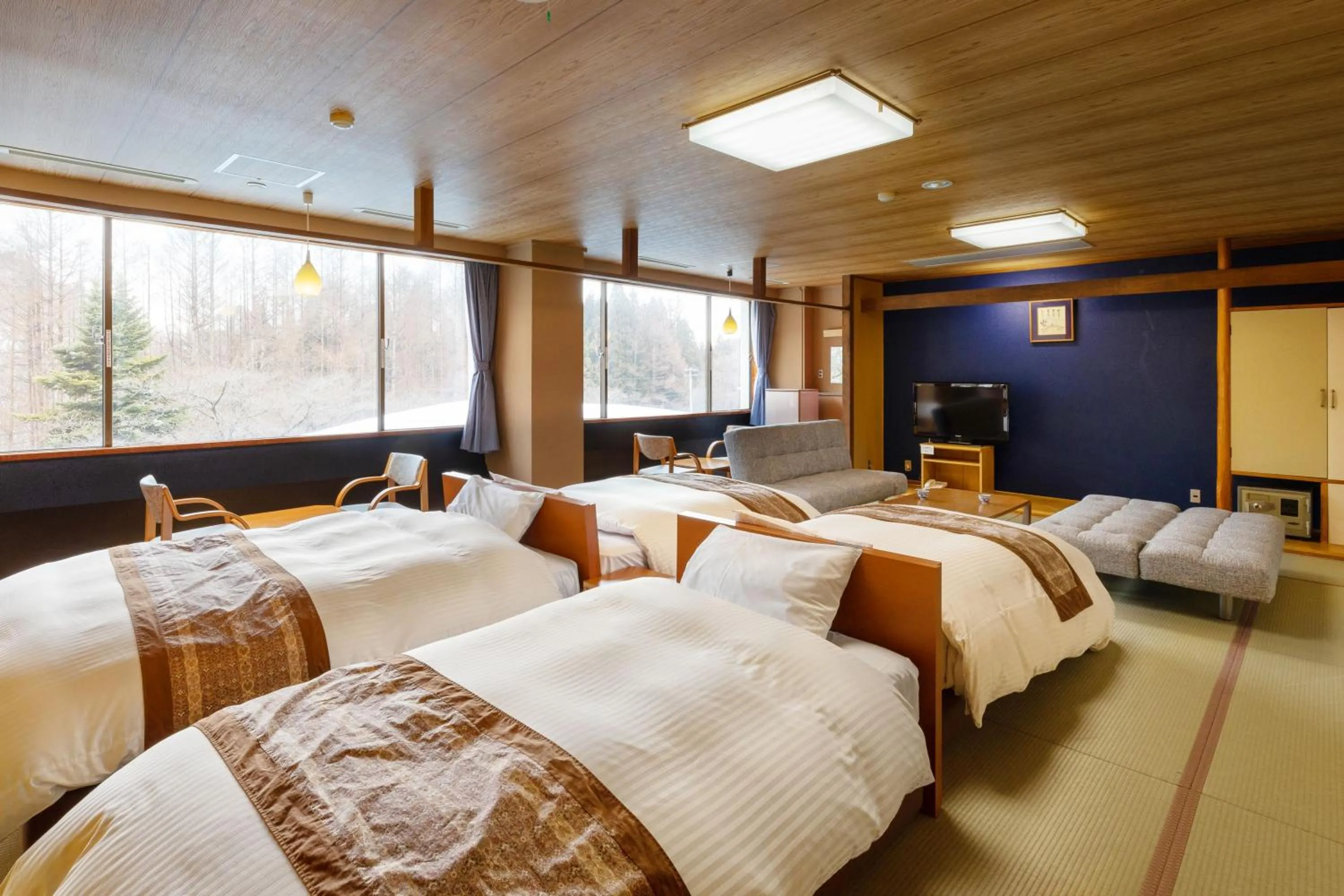 Bed in Takamiya Hotel Bonari no Mori