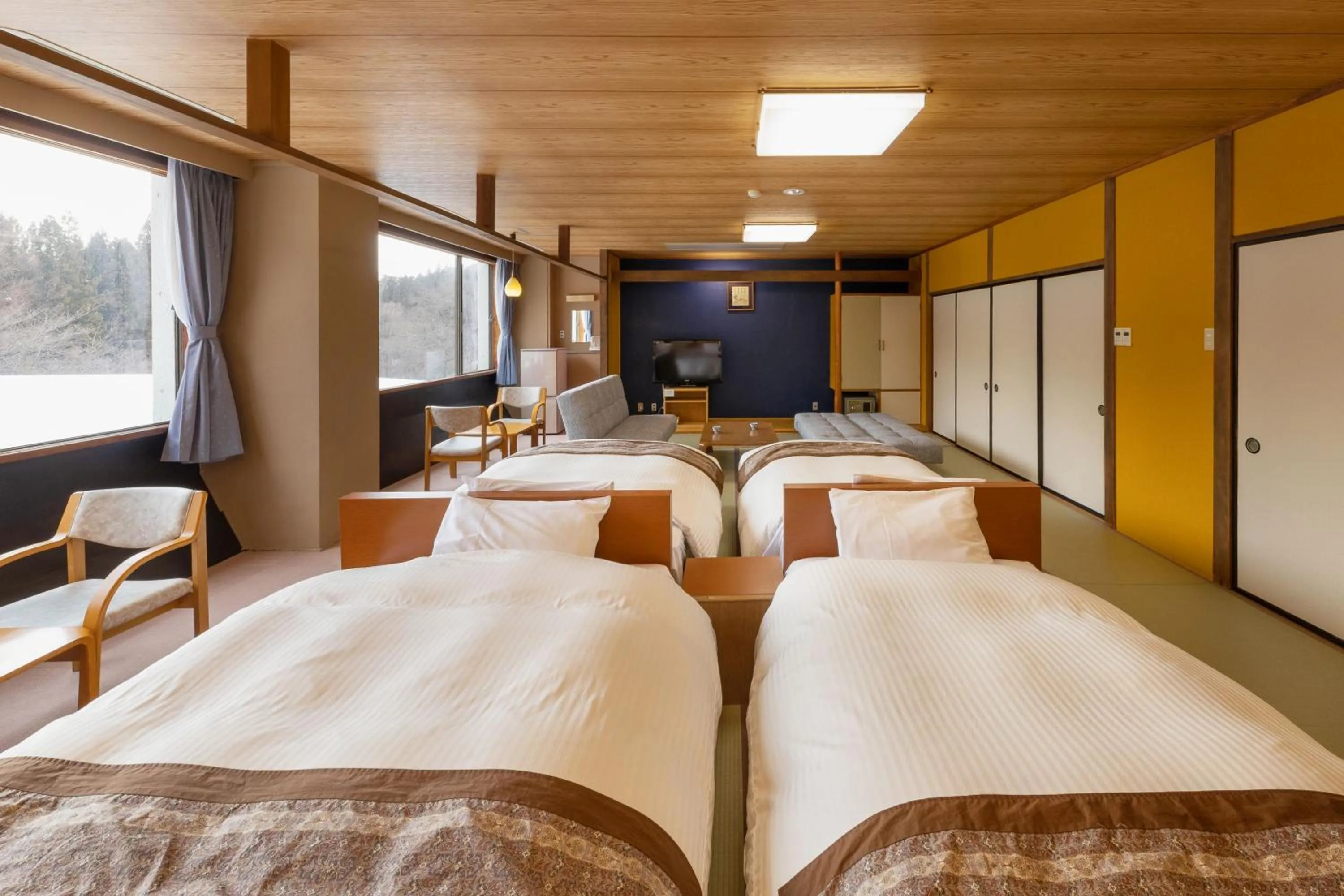 Bed in Takamiya Hotel Bonari no Mori