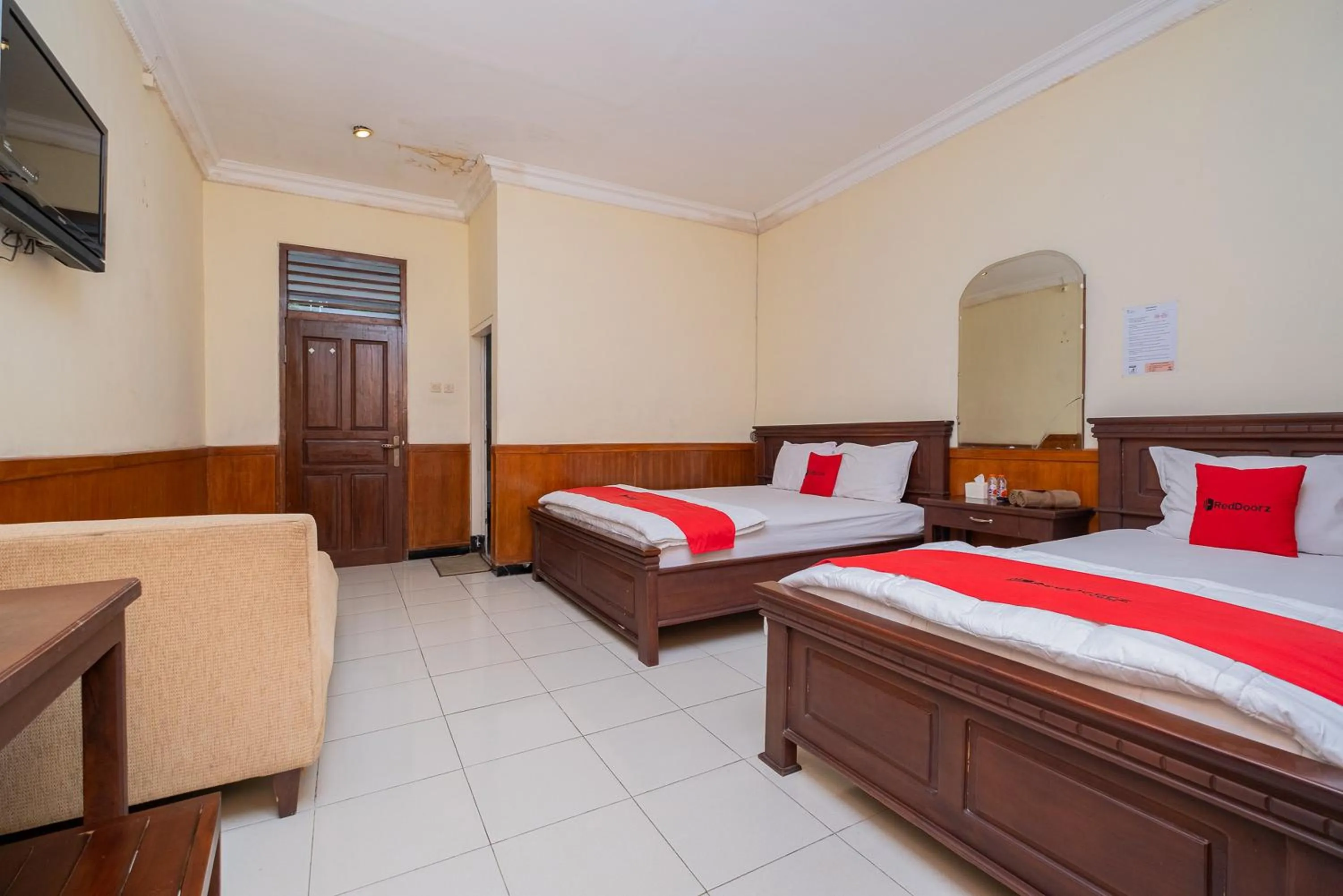 Bed in RedDoorz near Bojonegoro Train Station