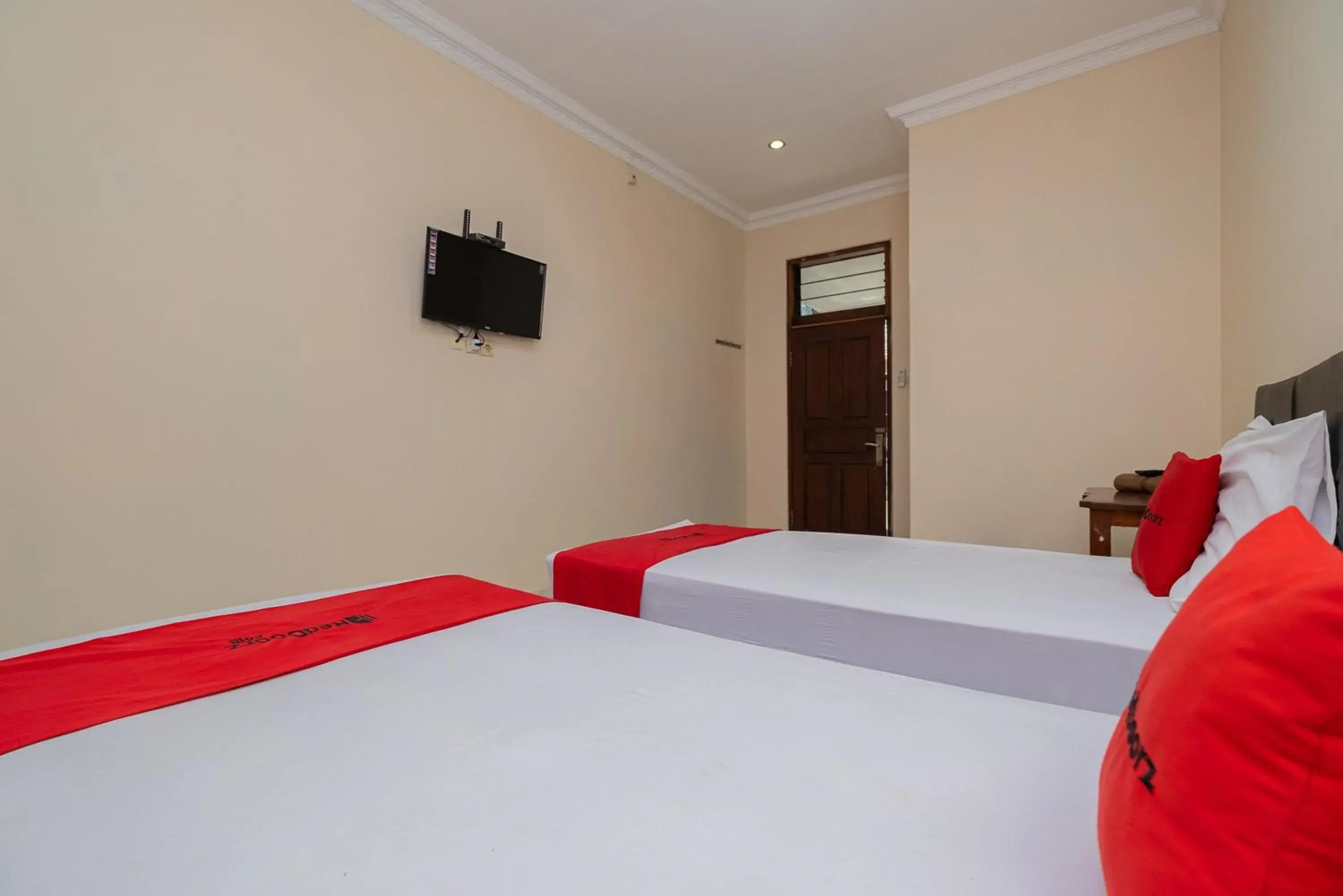 Bed in RedDoorz near Bojonegoro Train Station Bed in RedDoorz near Bojonegoro Train Station
