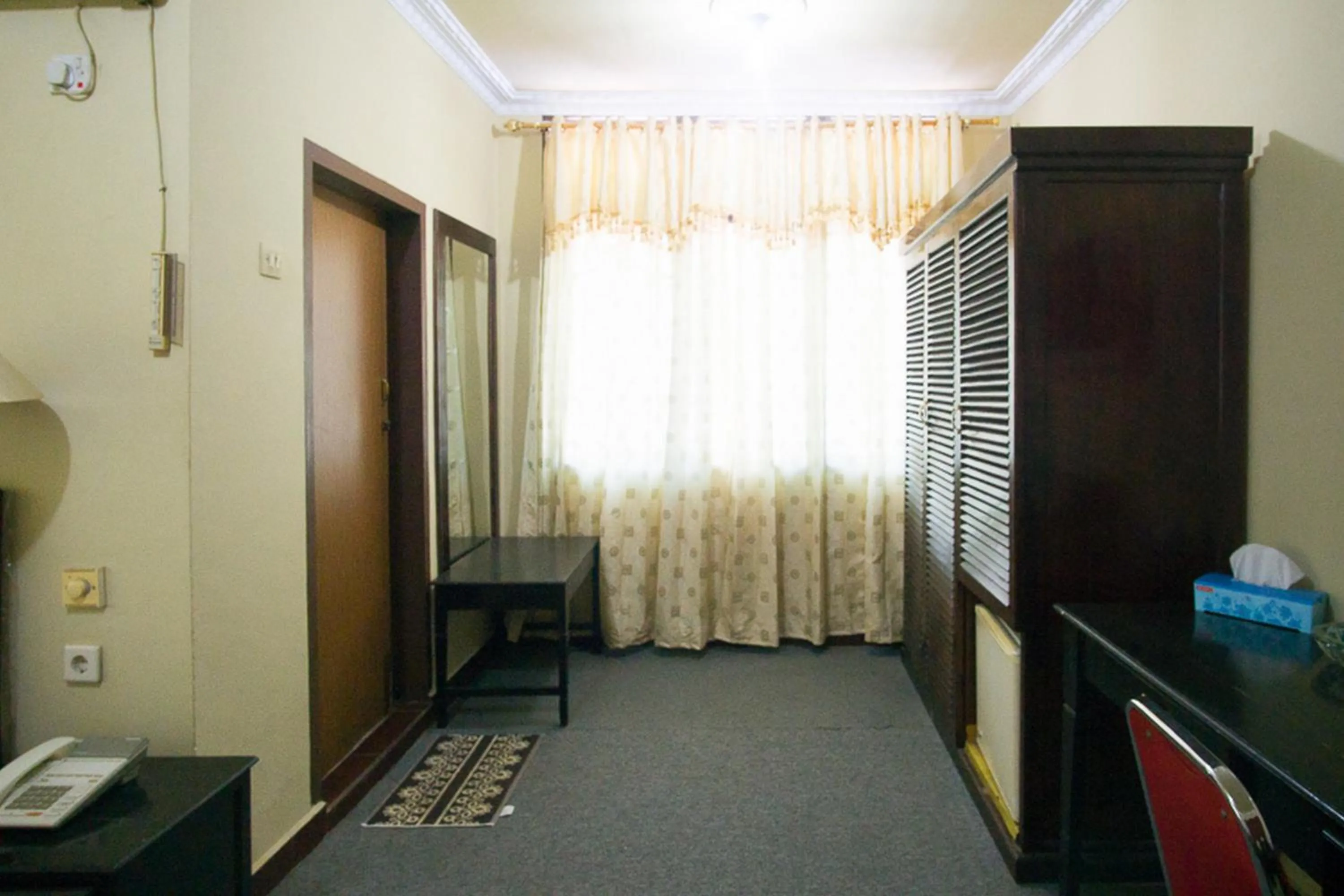 Seating area in RedDoorz plus near Pelabuhan Bitung