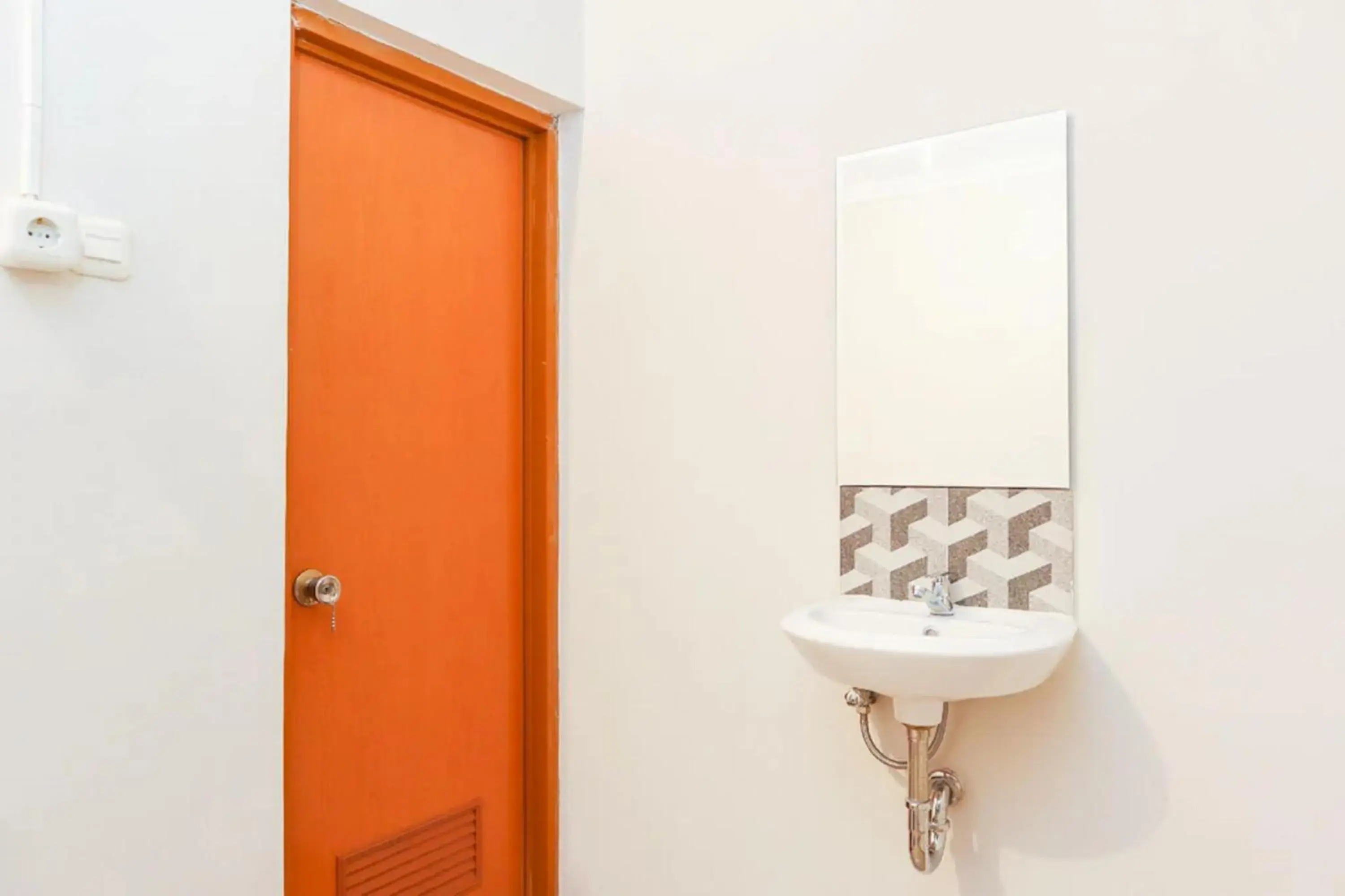 Bathroom in Hotel O Axl Residence Bathroom in Hotel O Axl Residence