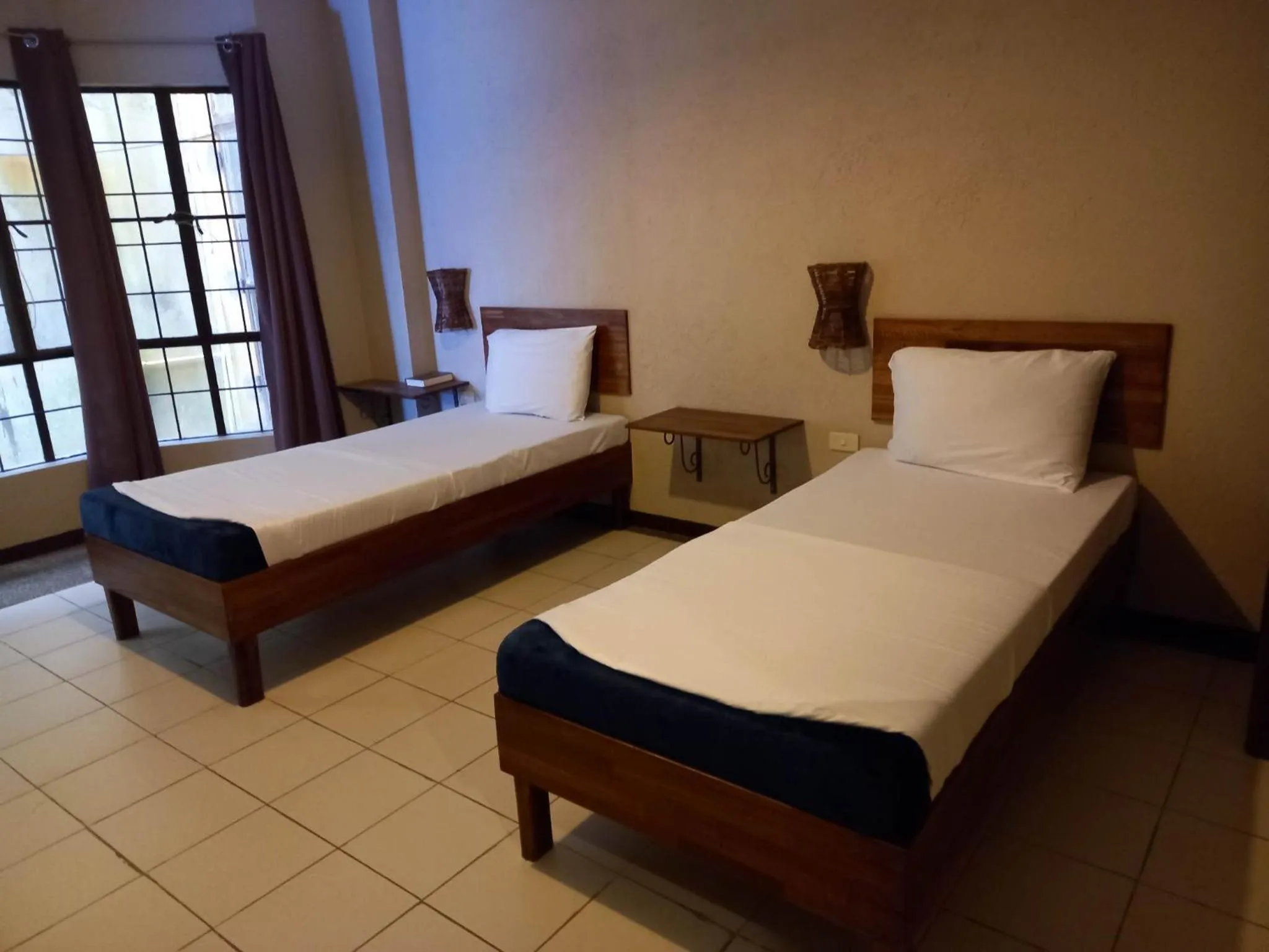 Bedroom in Alfonso Hotel