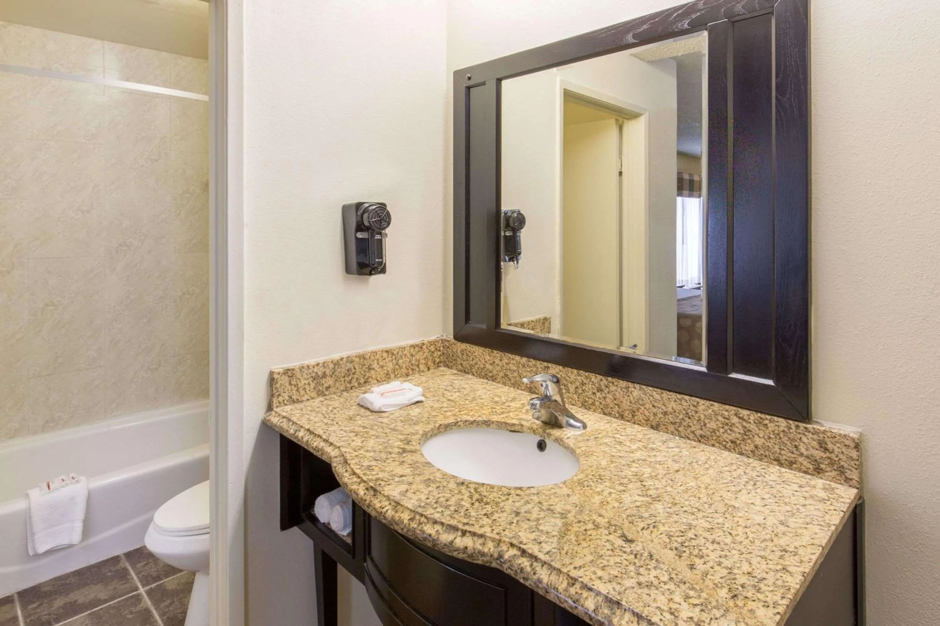 Bathroom in Ramada by Wyndham Ontario Airport & Convention Center