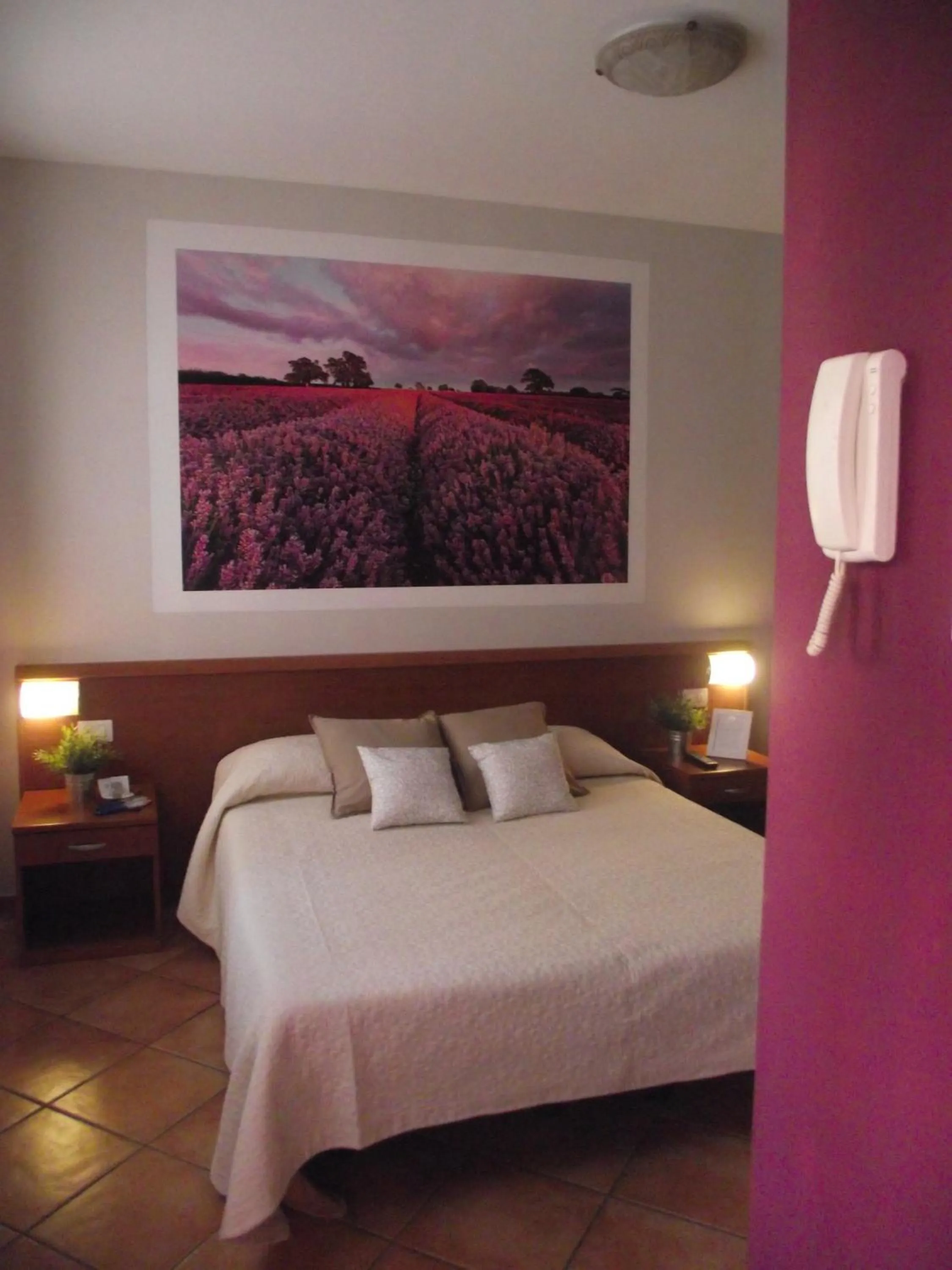 Bedroom in La Corte Albergo