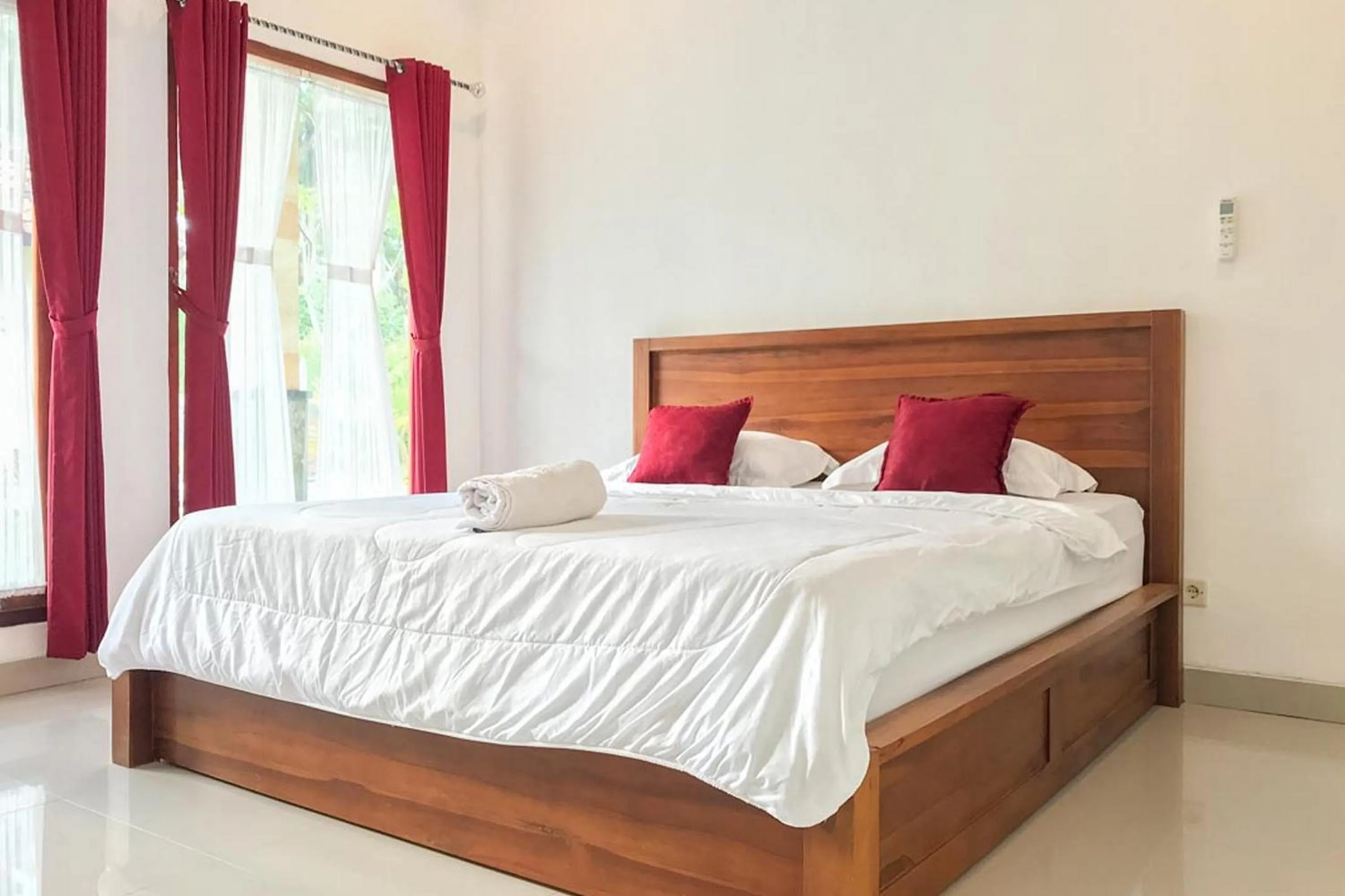 Bed in Omah Nusa Guesthouse RedPartner