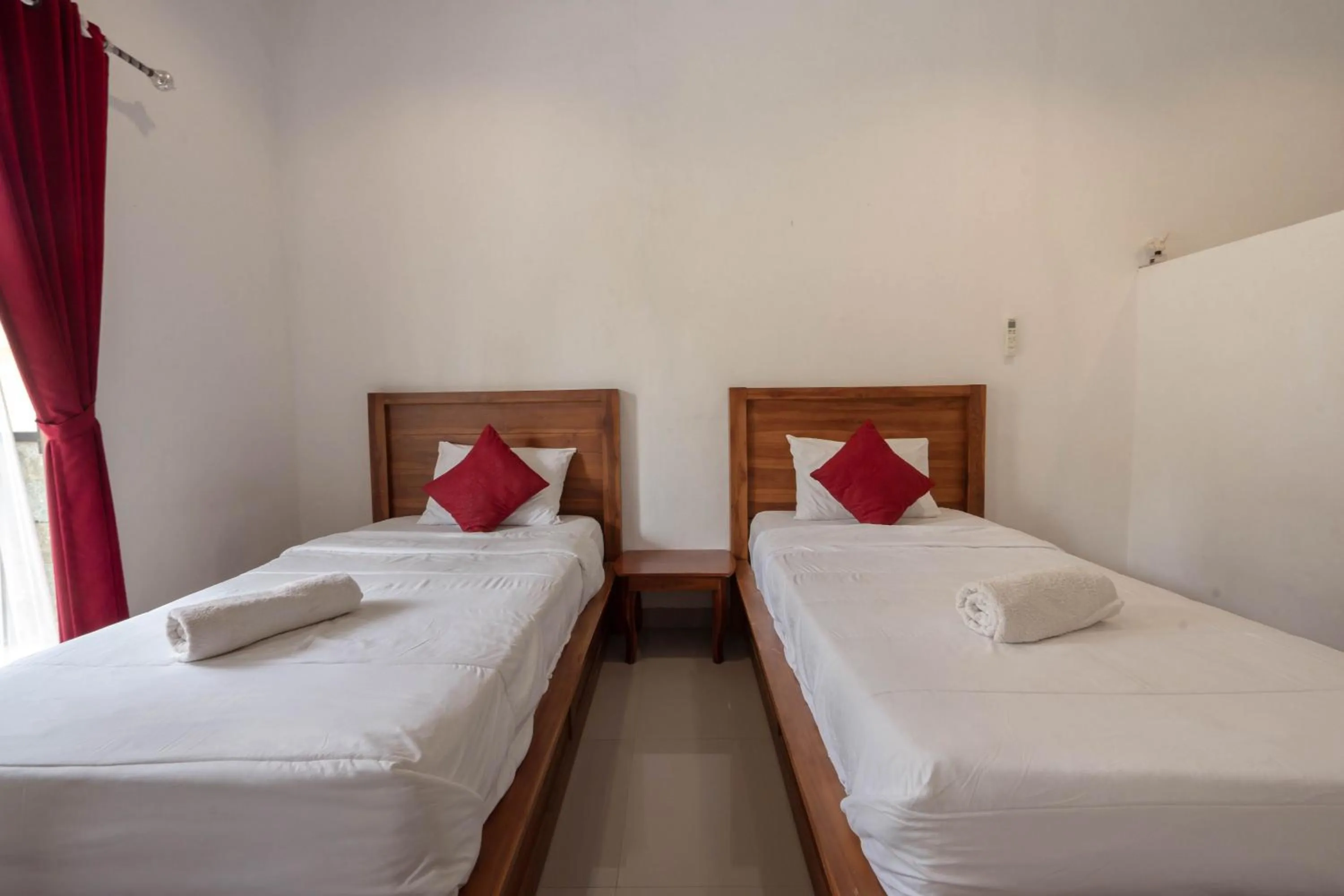 Bed in Omah Nusa Guesthouse RedPartner