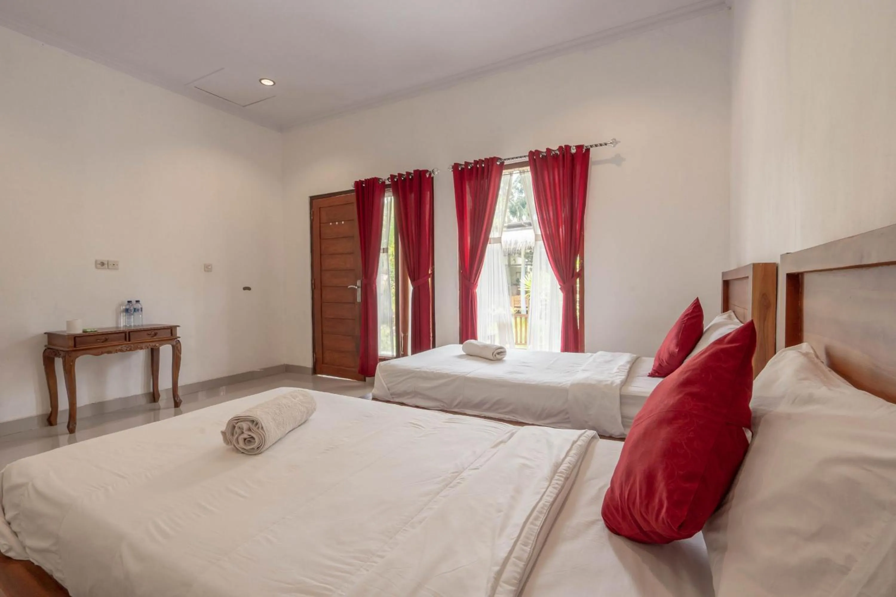 Bed in Omah Nusa Guesthouse RedPartner