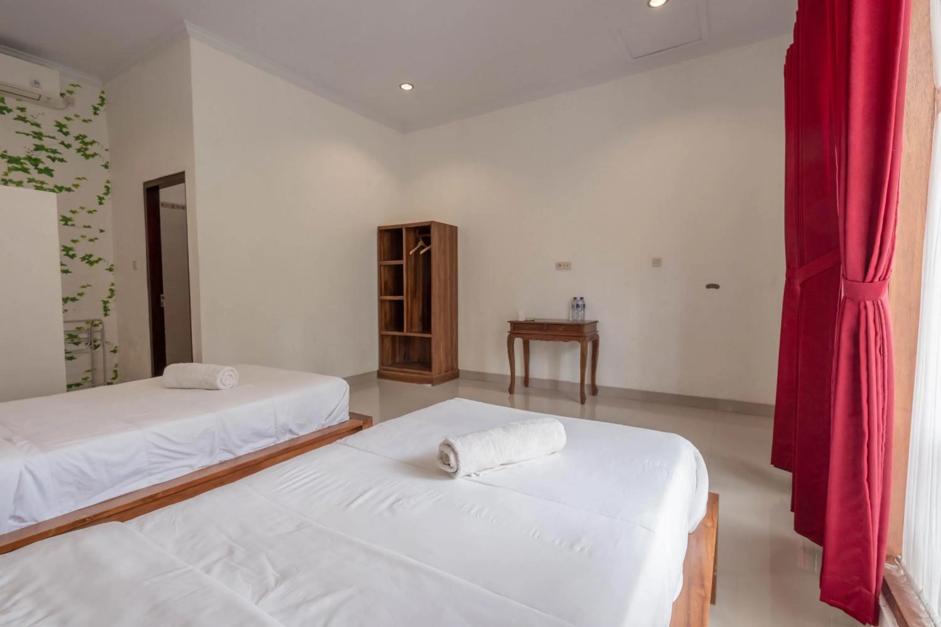 Bed in Omah Nusa Guesthouse RedPartner