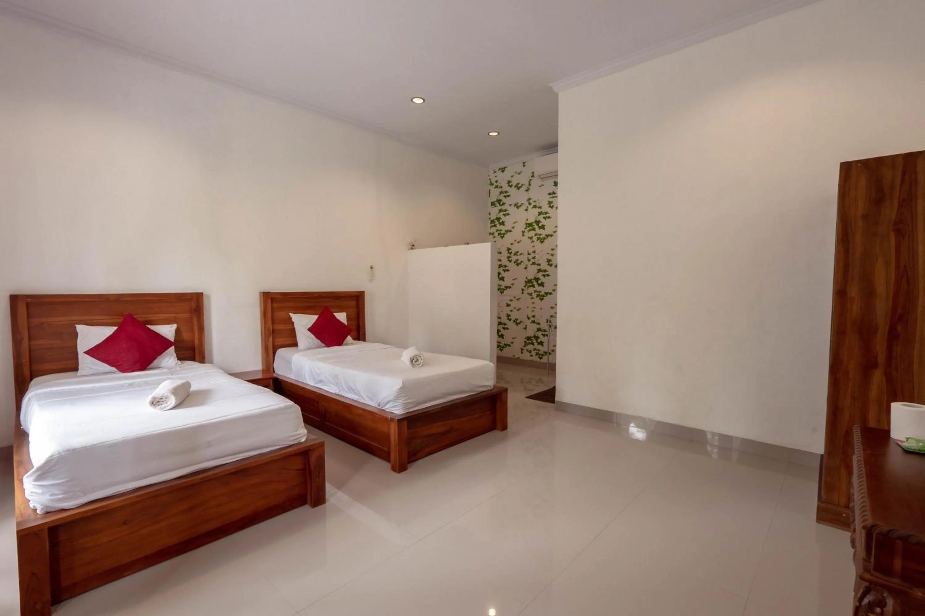 Bed in Omah Nusa Guesthouse RedPartner