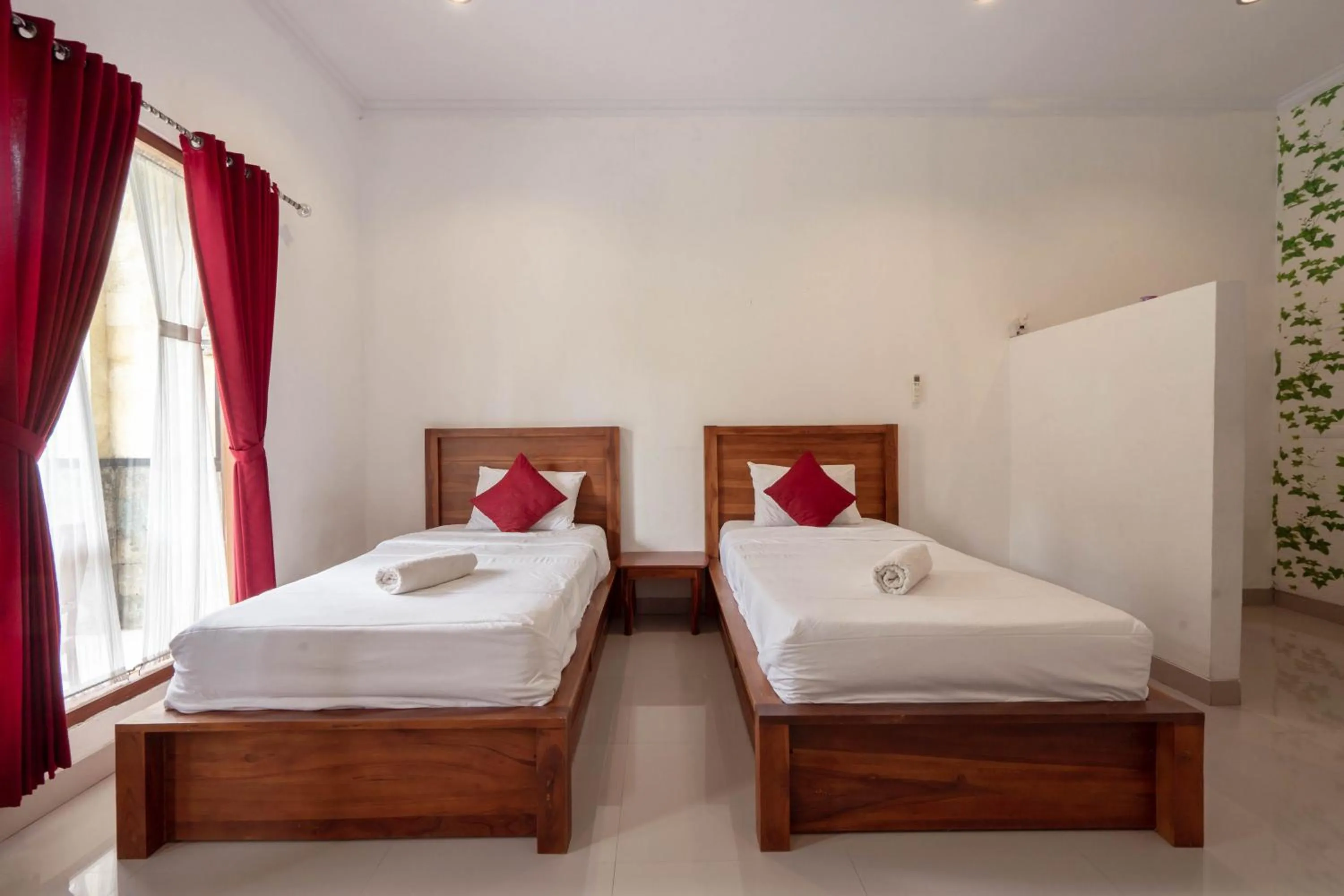 Bed in Omah Nusa Guesthouse RedPartner