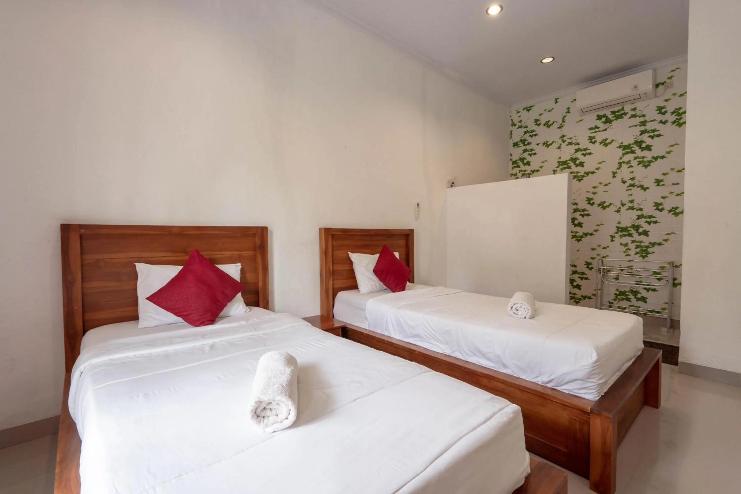 Bed in Omah Nusa Guesthouse RedPartner