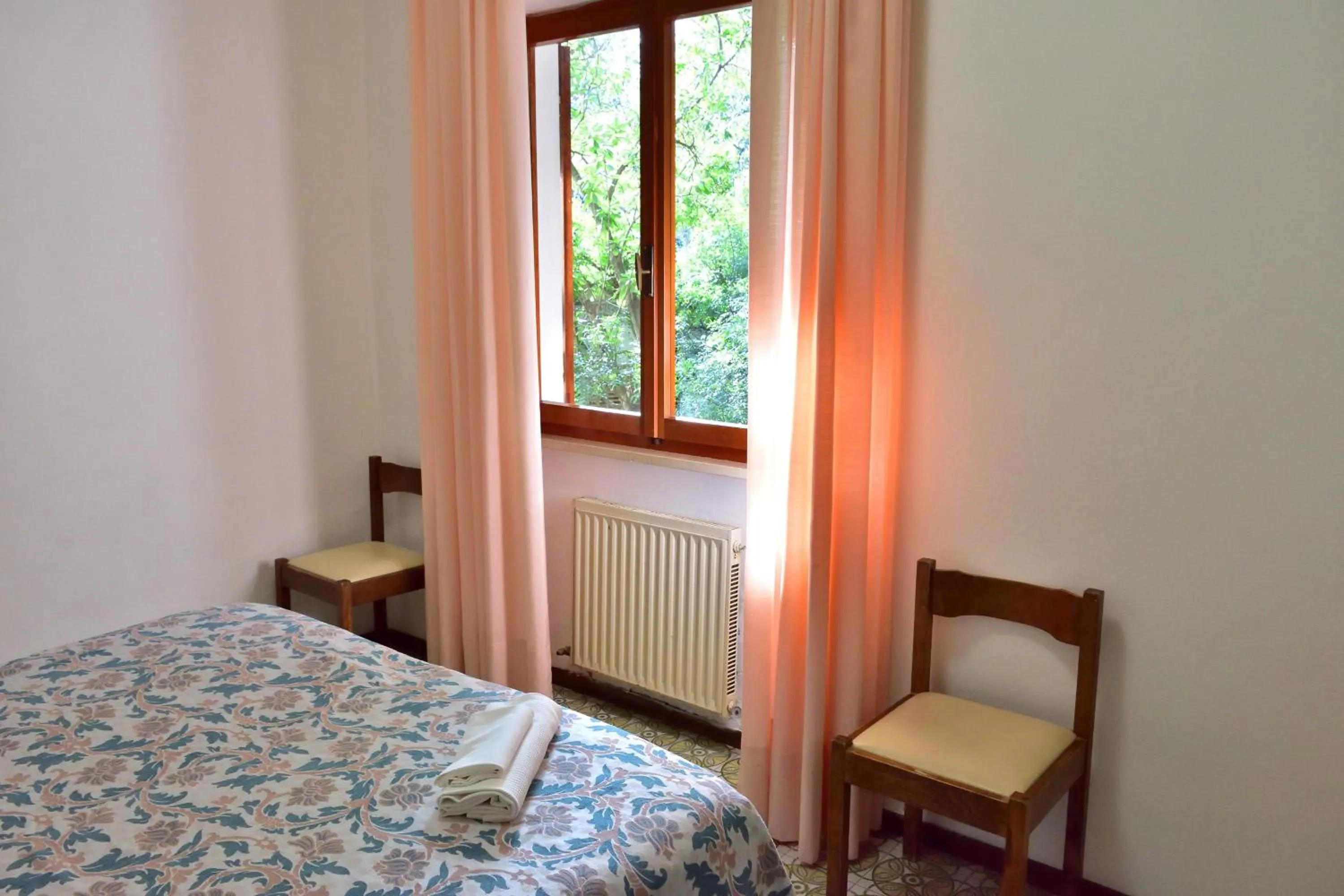 Bed in Eden Park Hotel