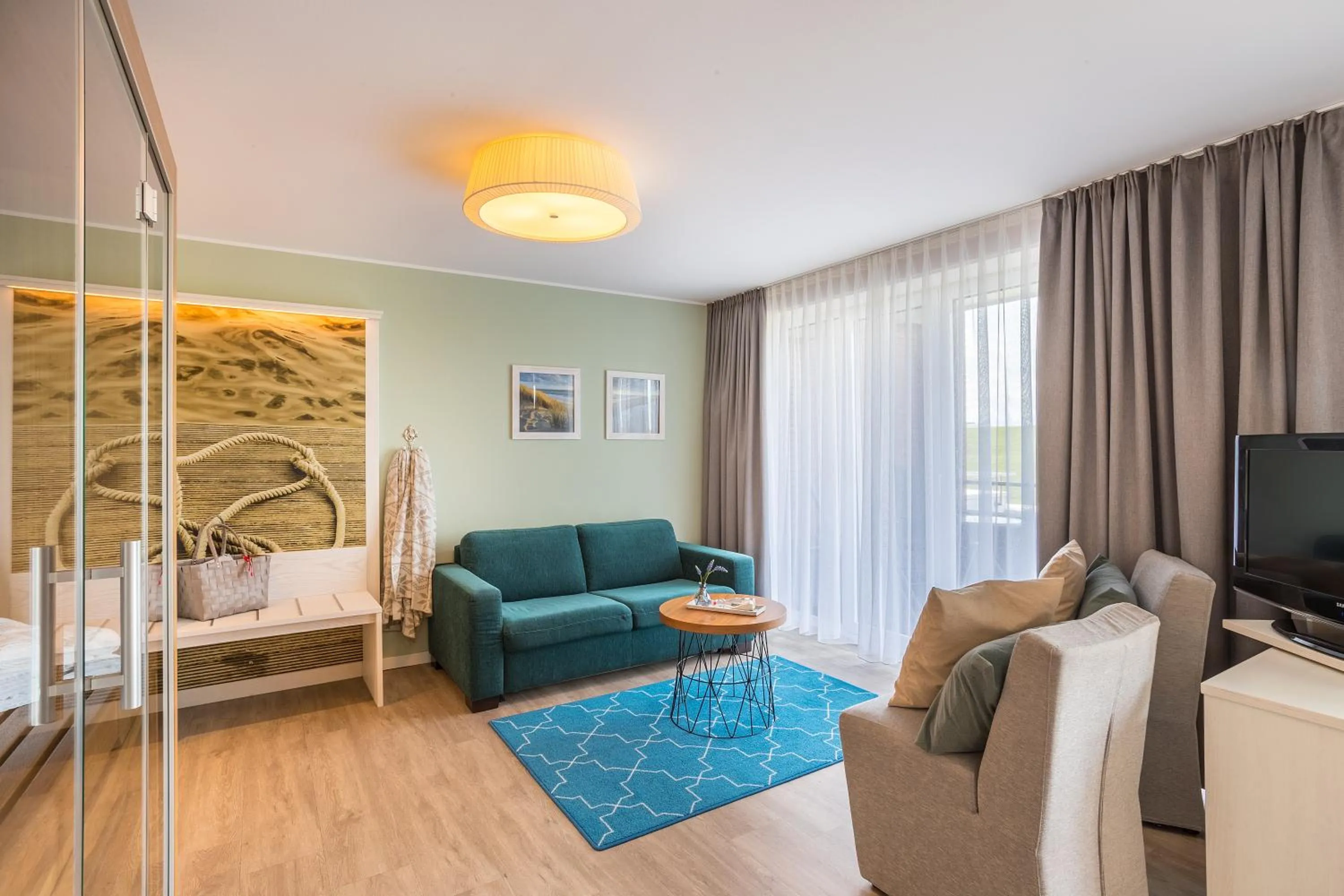 Living room, Bed in Hotel Regina Maris