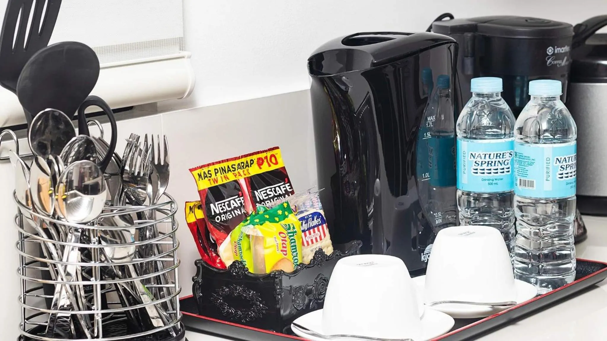 Coffee/tea facilities in Evania by J&J Homes 2BR Unit At One Oasis Cebu