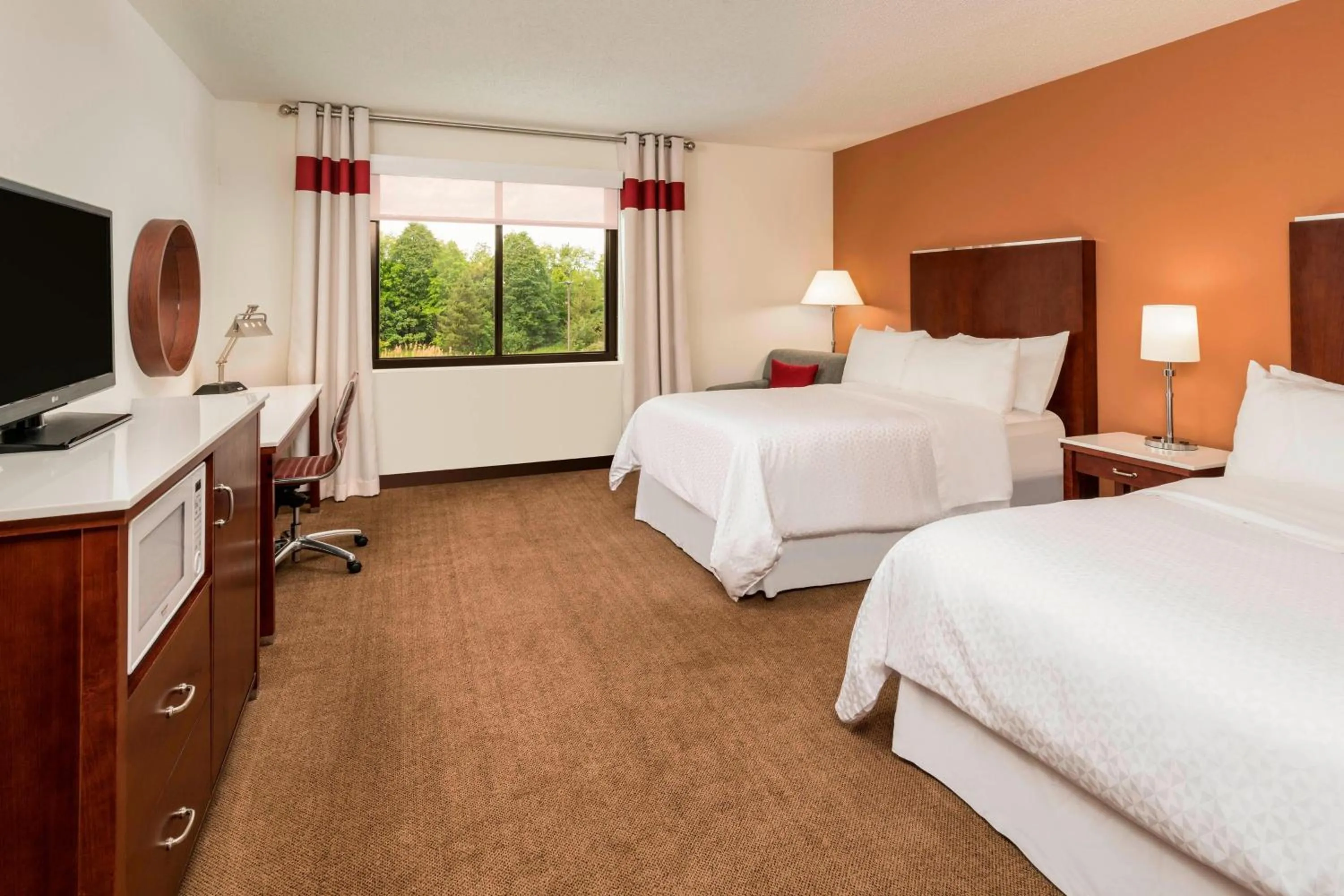Photo of the whole room, Bed in Four Points by Sheraton Boston Logan Airport Revere