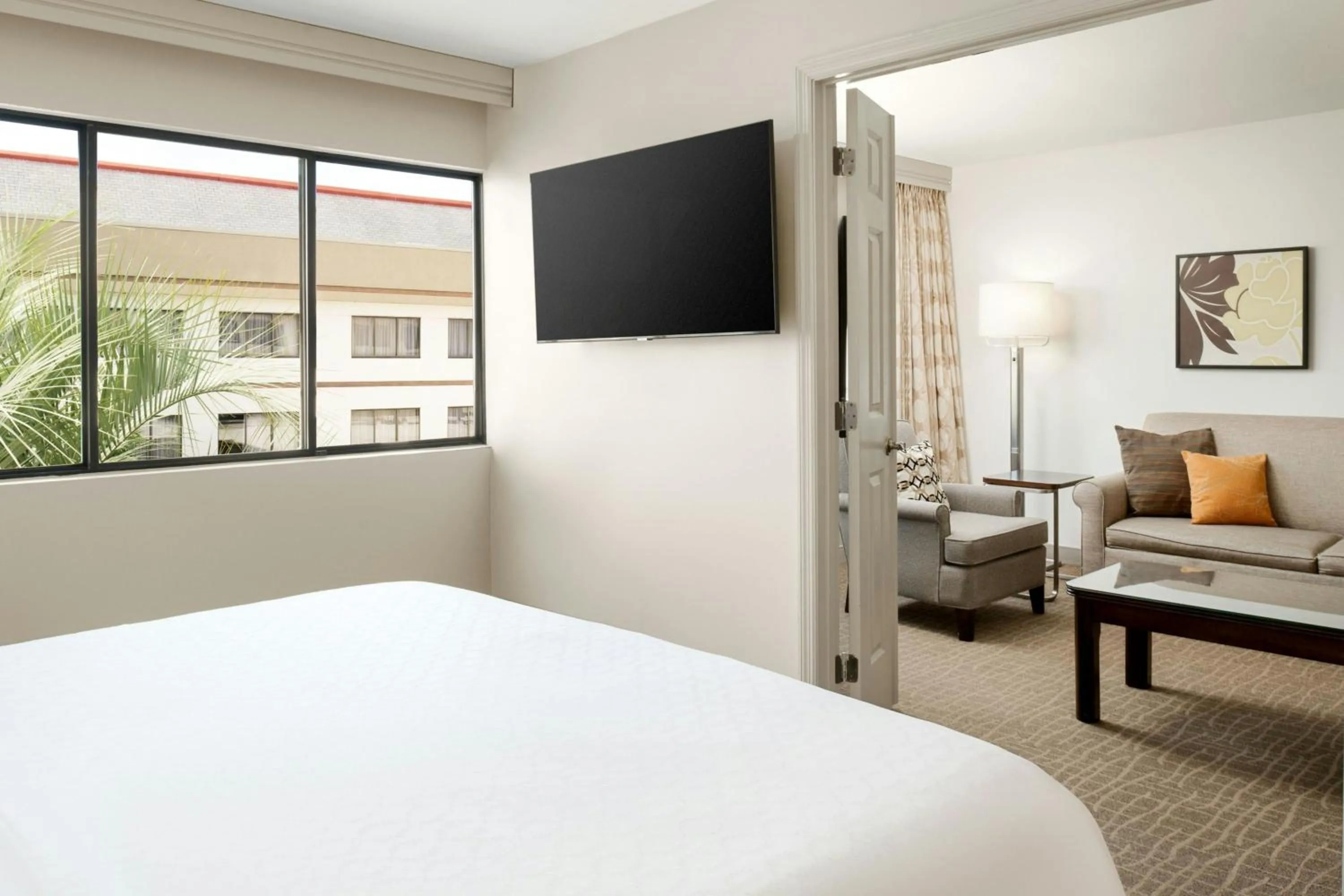 Photo of the whole room, Bed in Sheraton Suites Orlando Airport Hotel