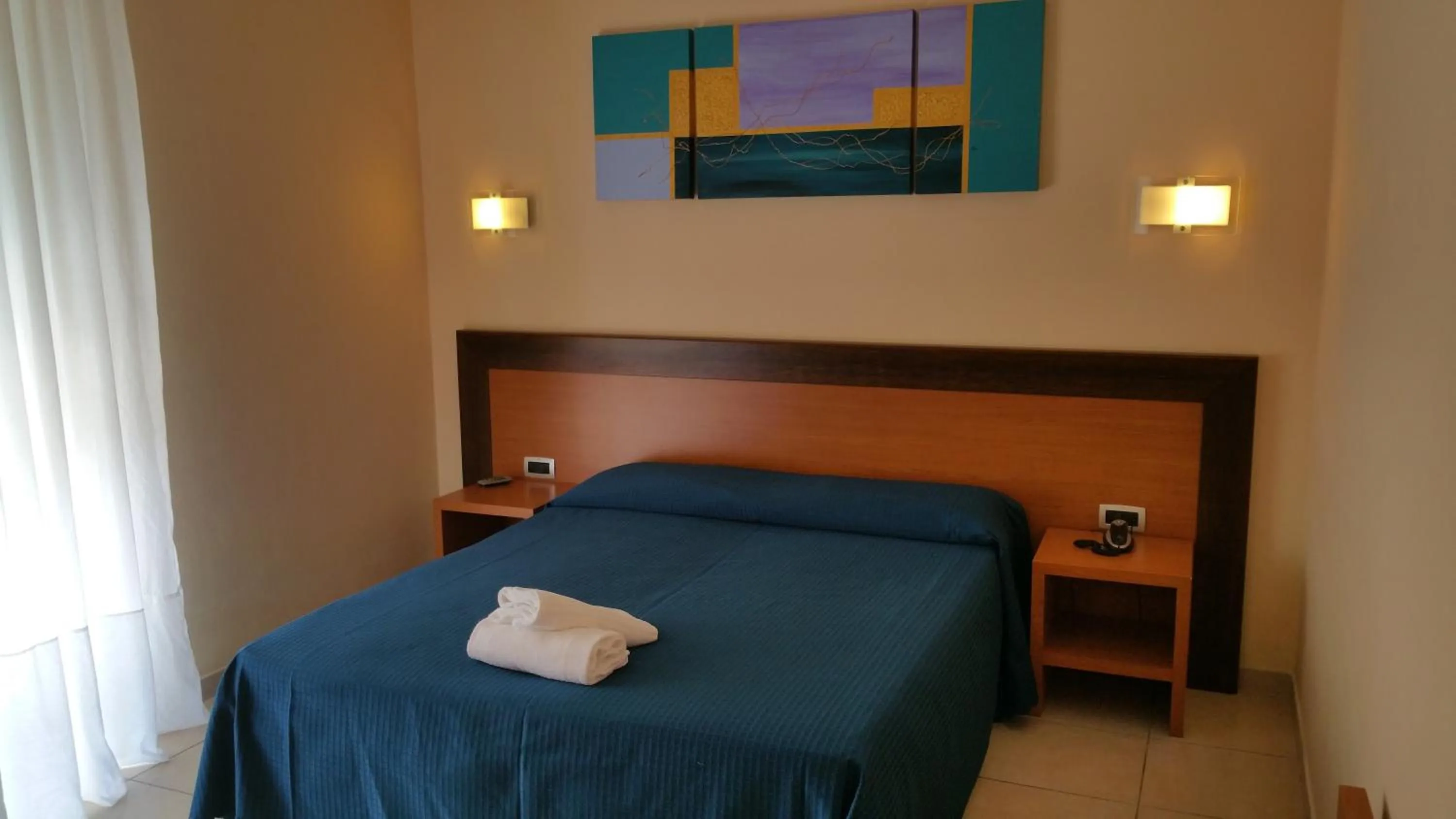 Bedroom in Hotel Club Koiné