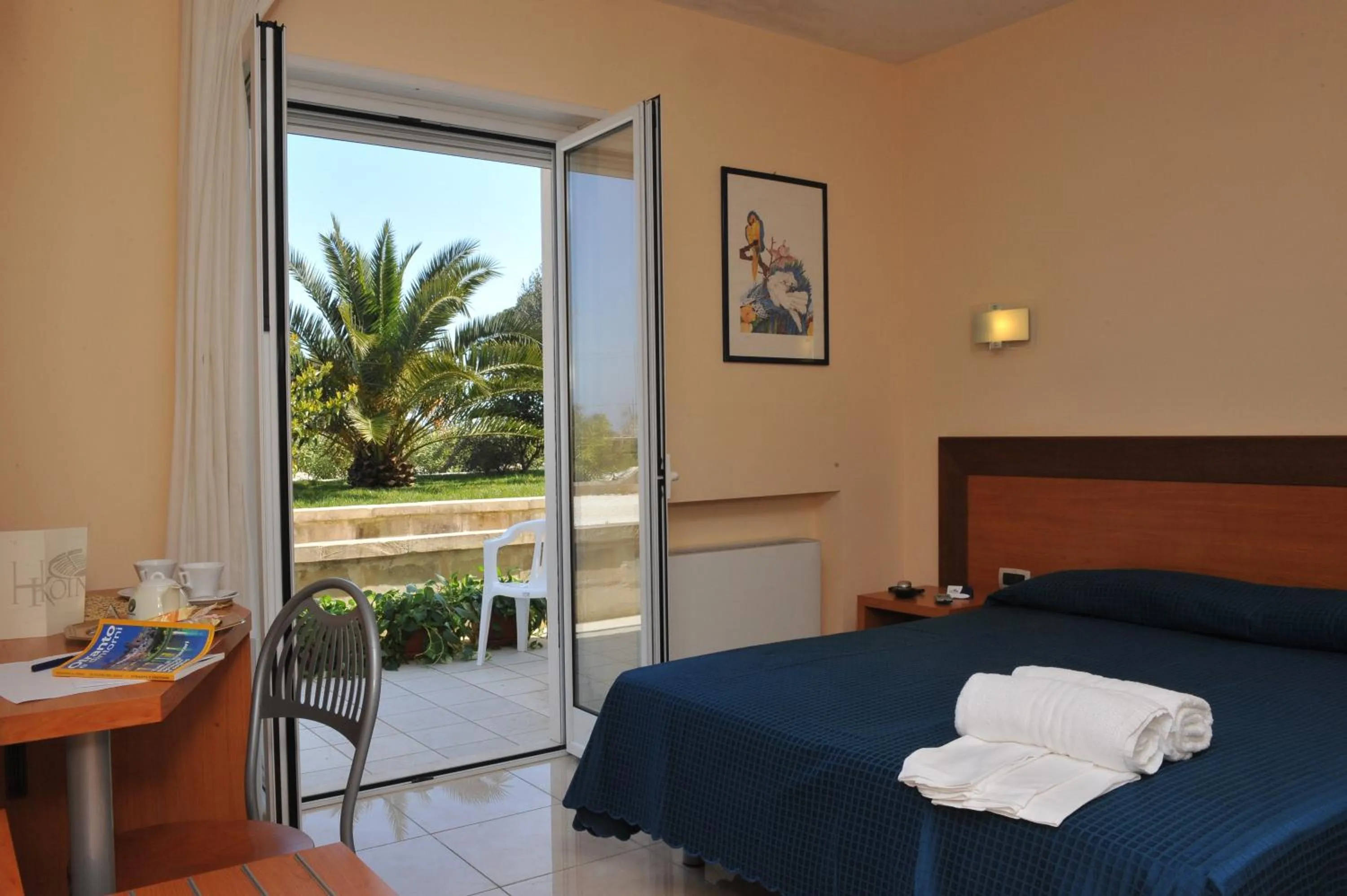 Bedroom in Hotel Club Koiné