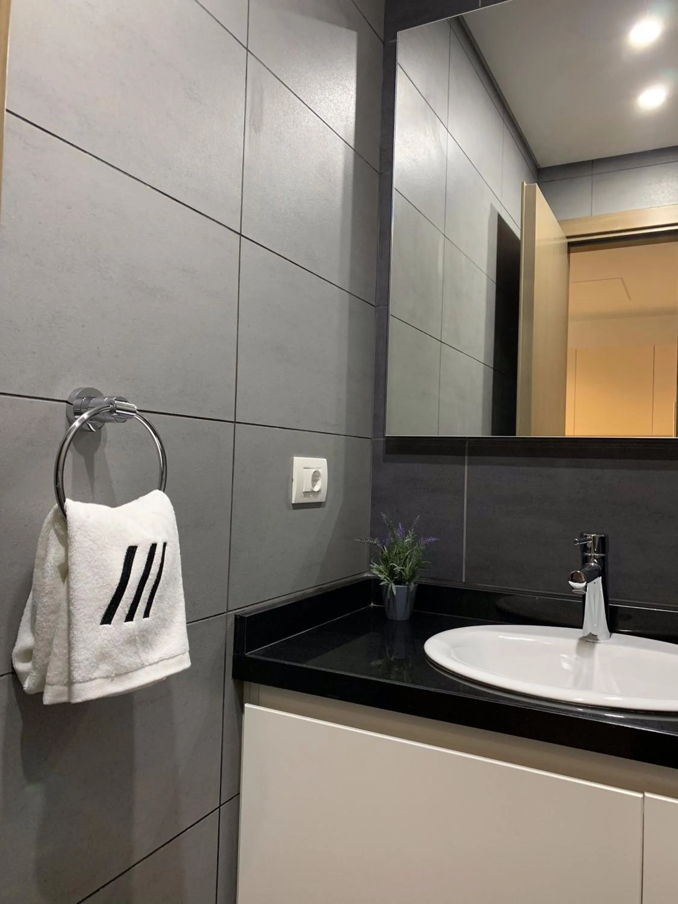 Bathroom in ZUR Studios and Suites