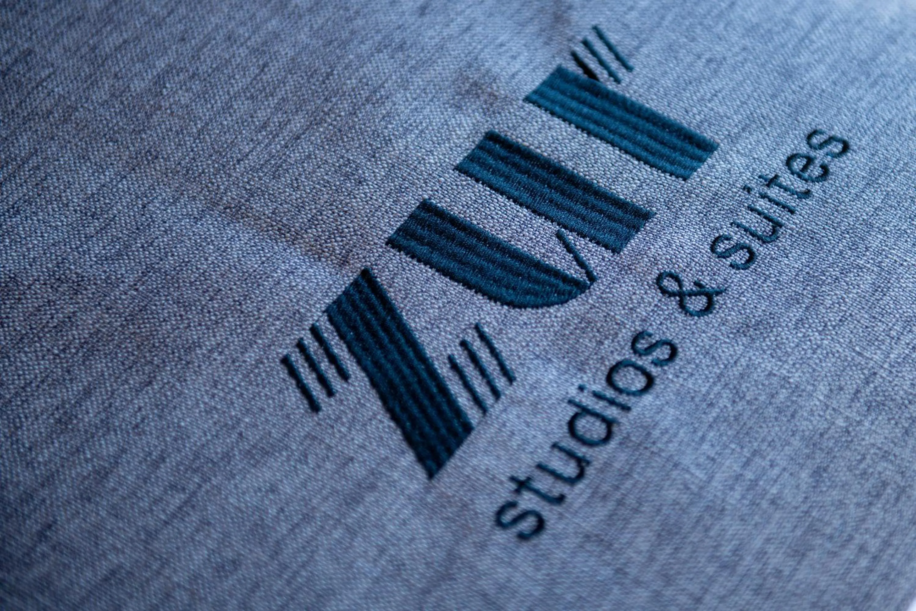 Property logo or sign in ZUR Studios and Suites