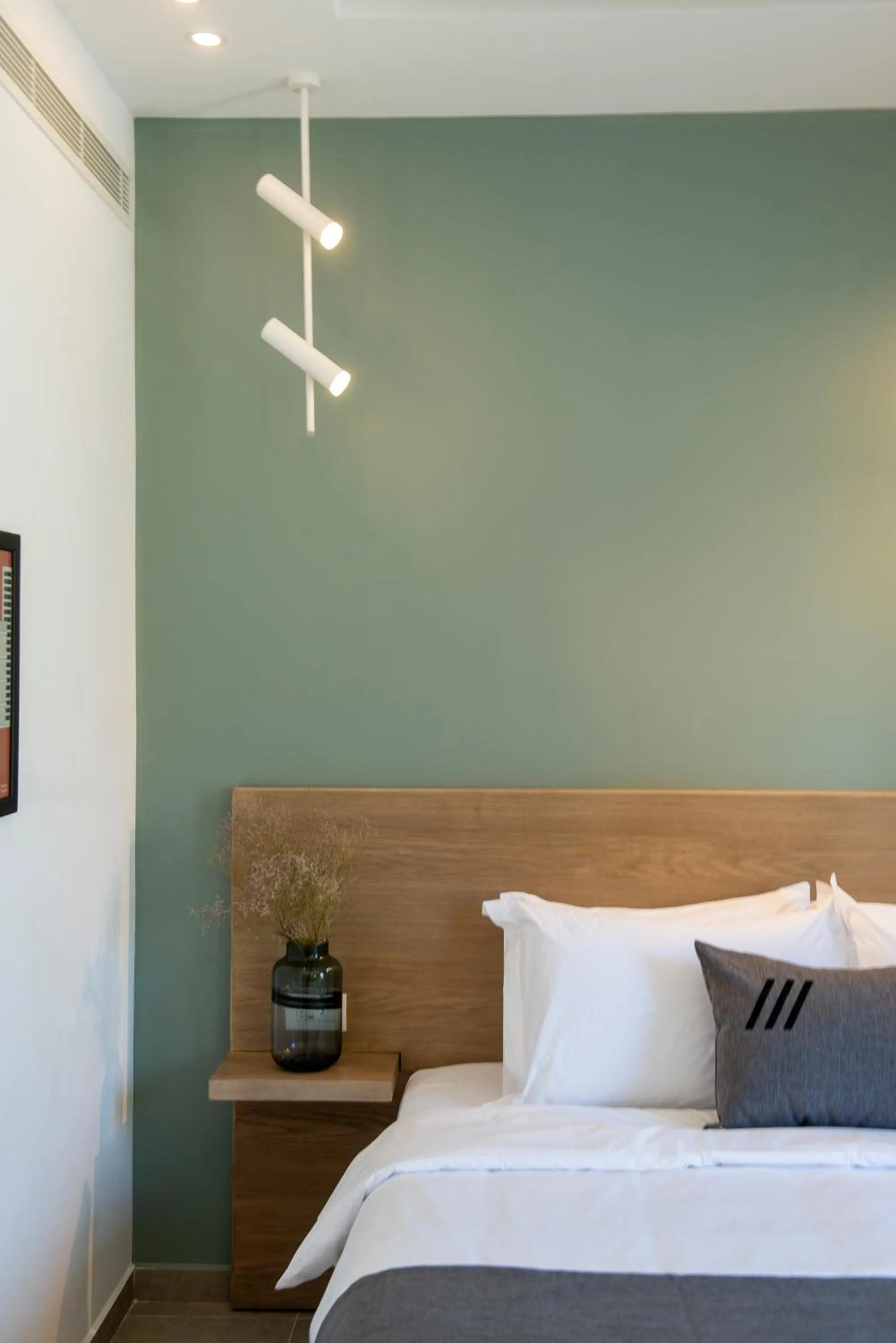 Bed in ZUR Studios and Suites