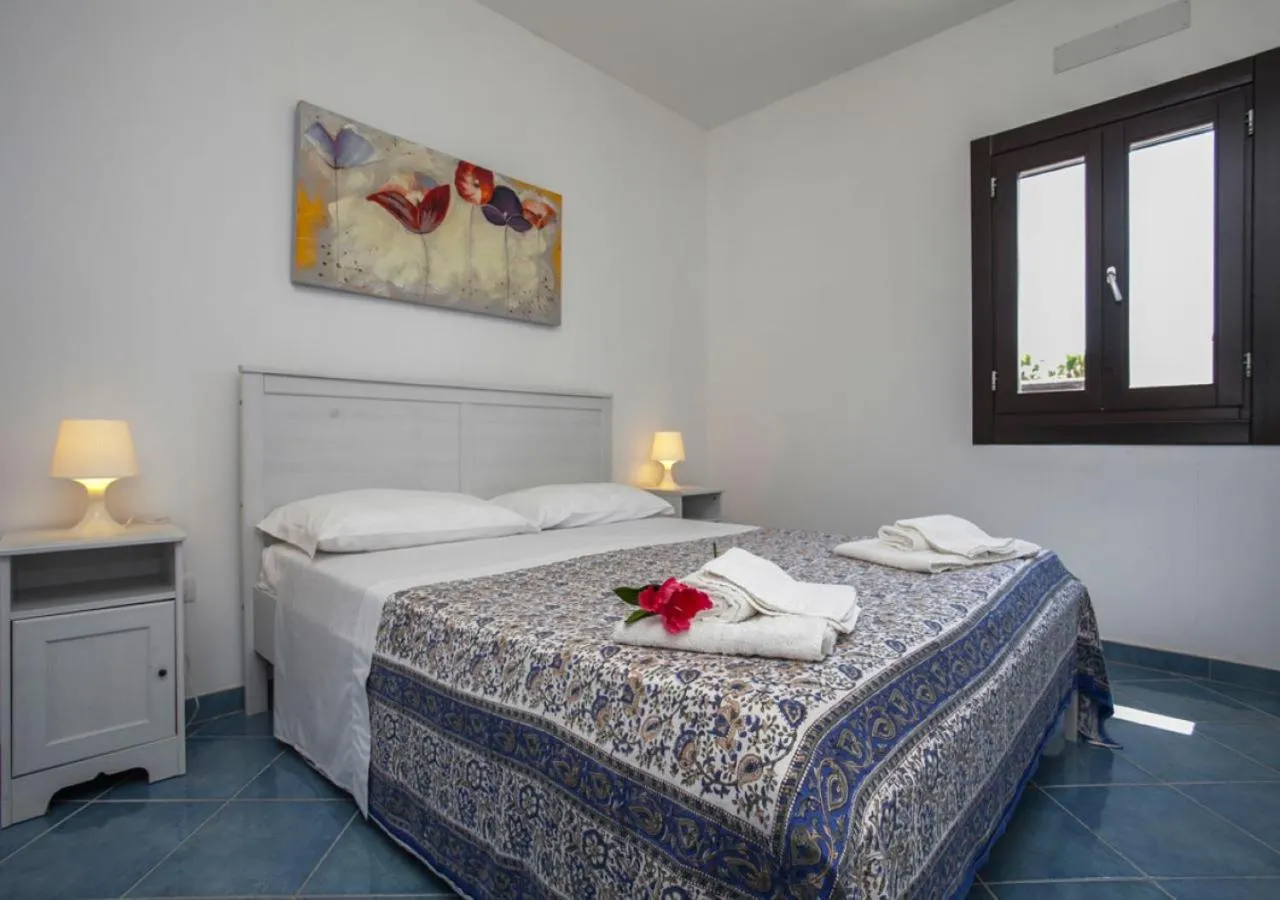 Bed in Chiusurelle Village Resort