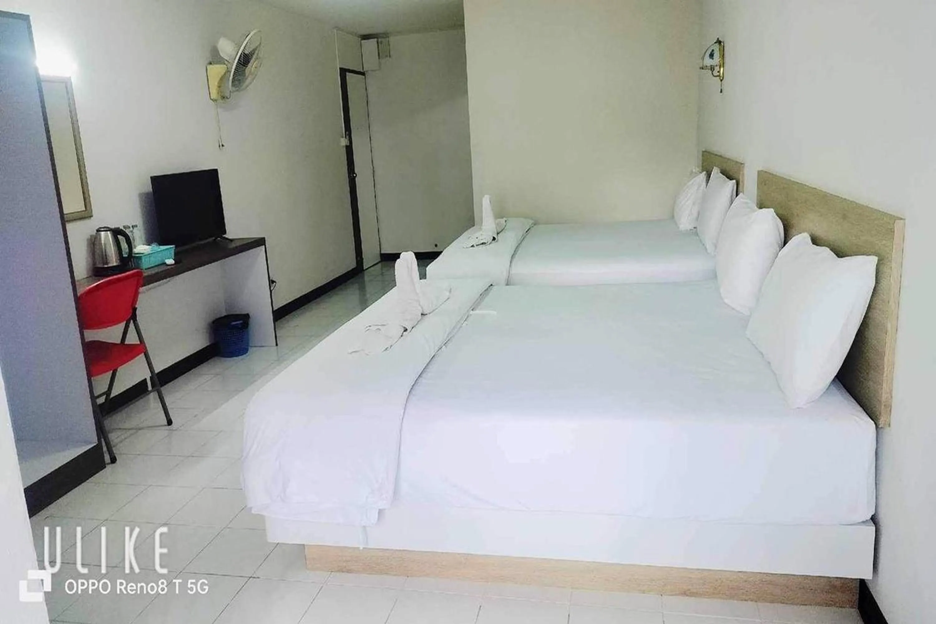 Bed in Boonchai Mansion