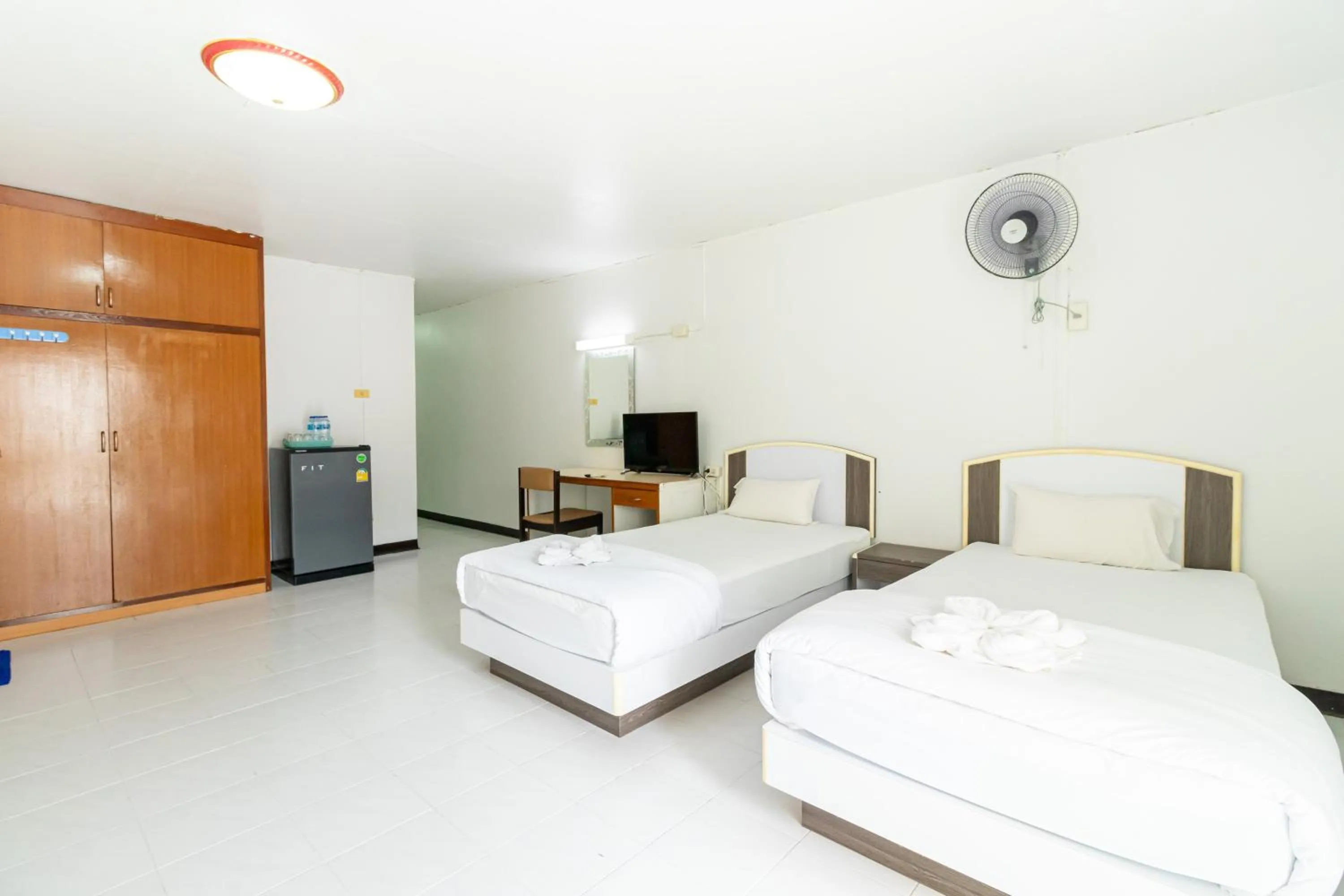 Bed in Boonchai Mansion