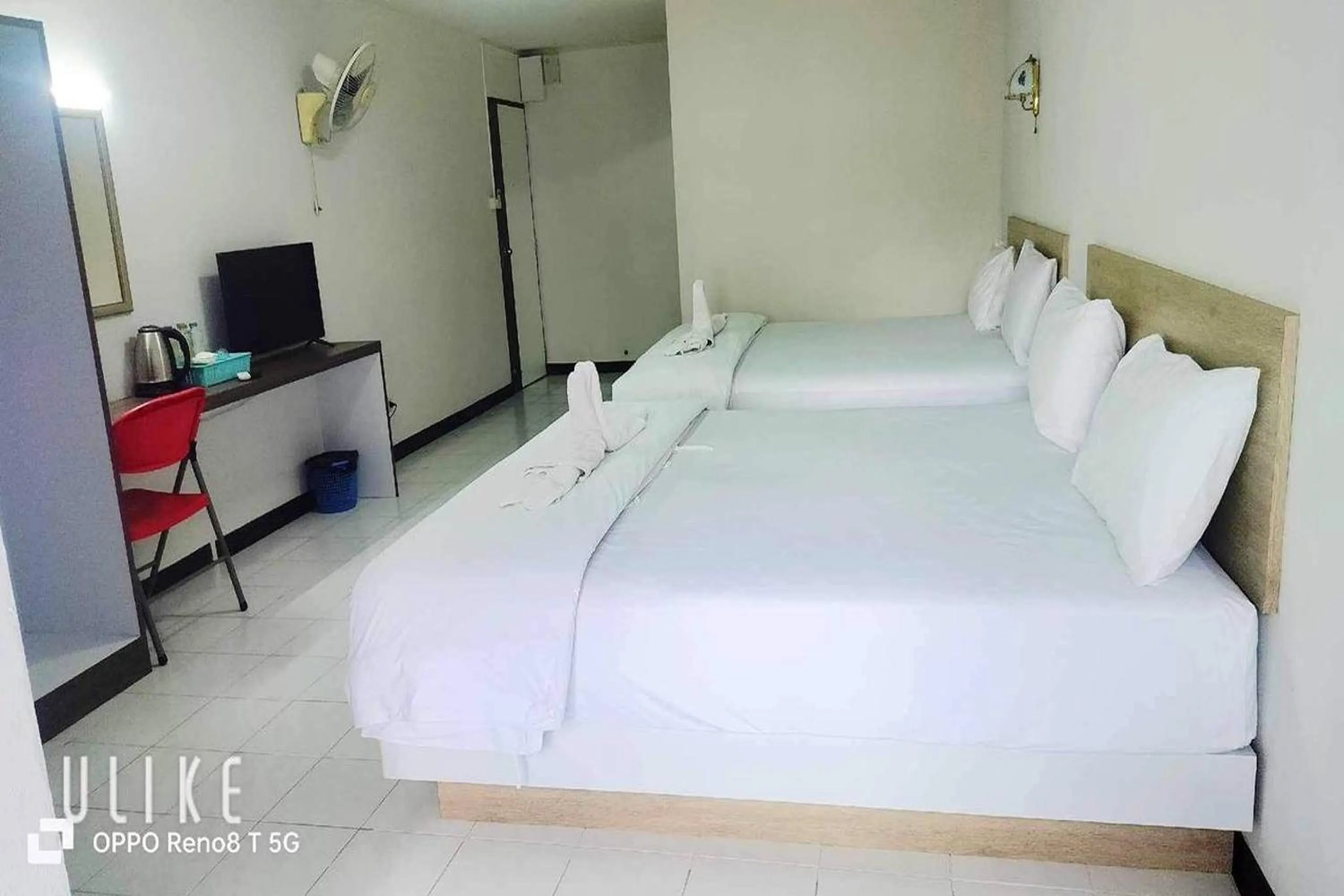 Bed in Boonchai Mansion