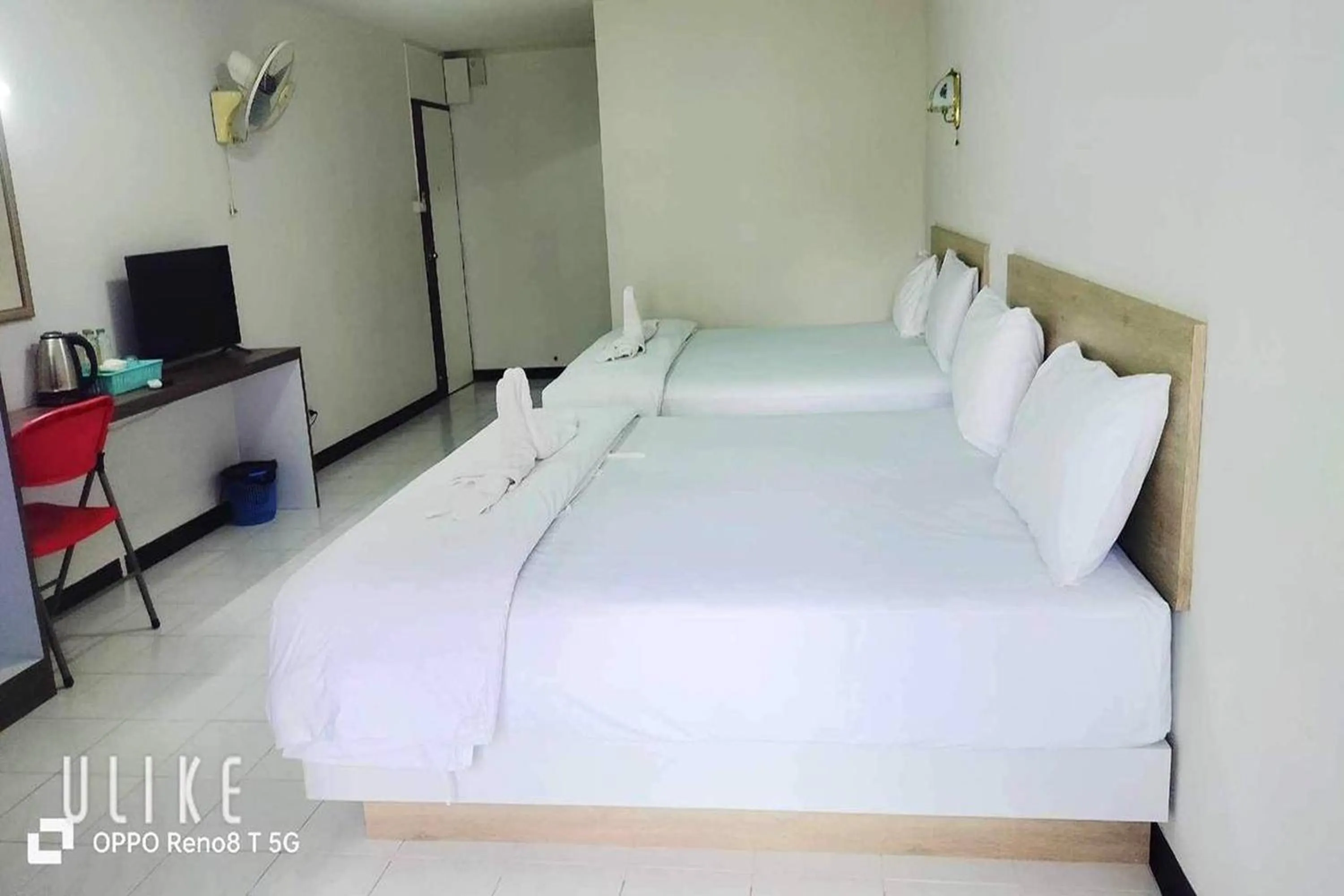 Bed in Boonchai Mansion