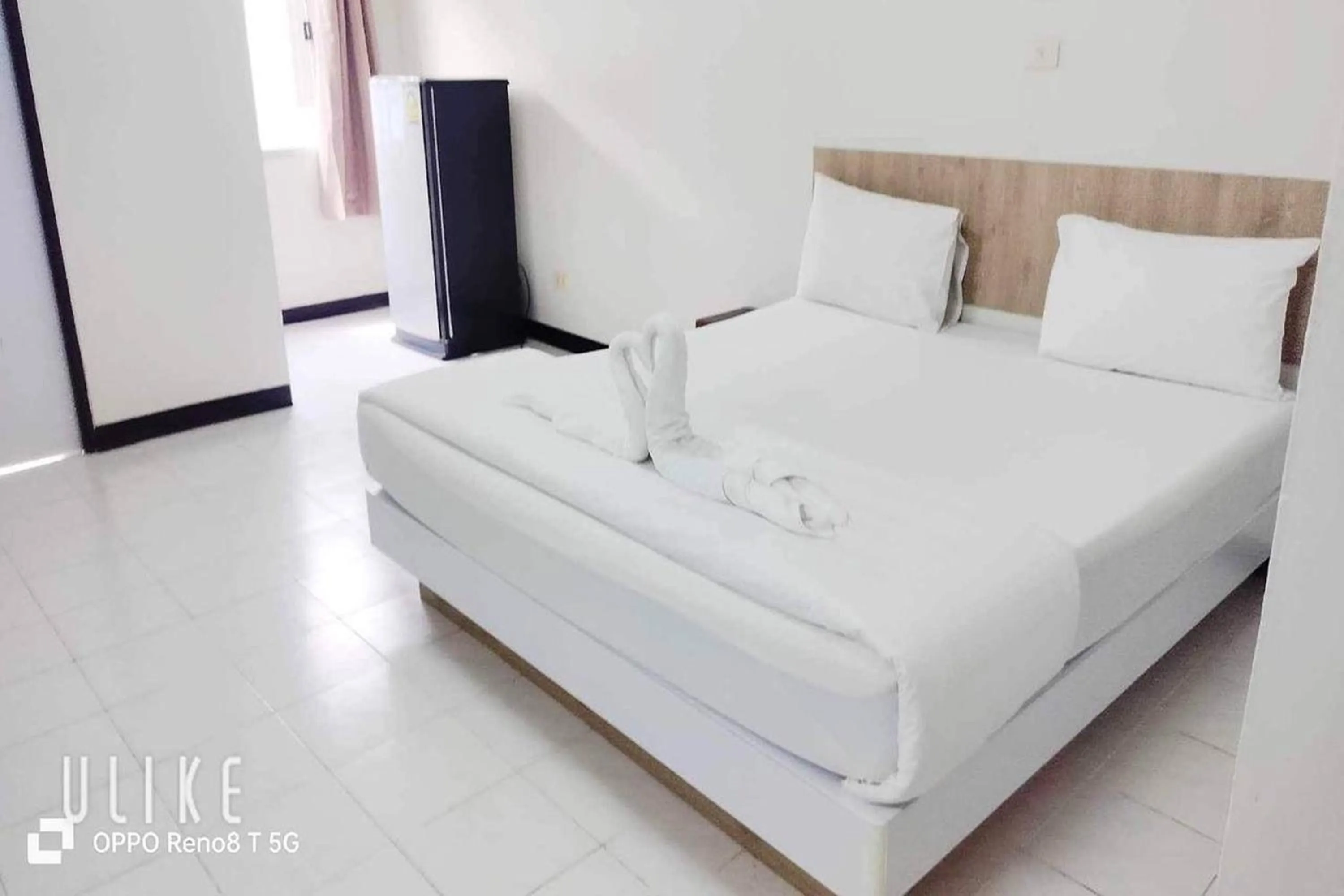 Bed in Boonchai Mansion