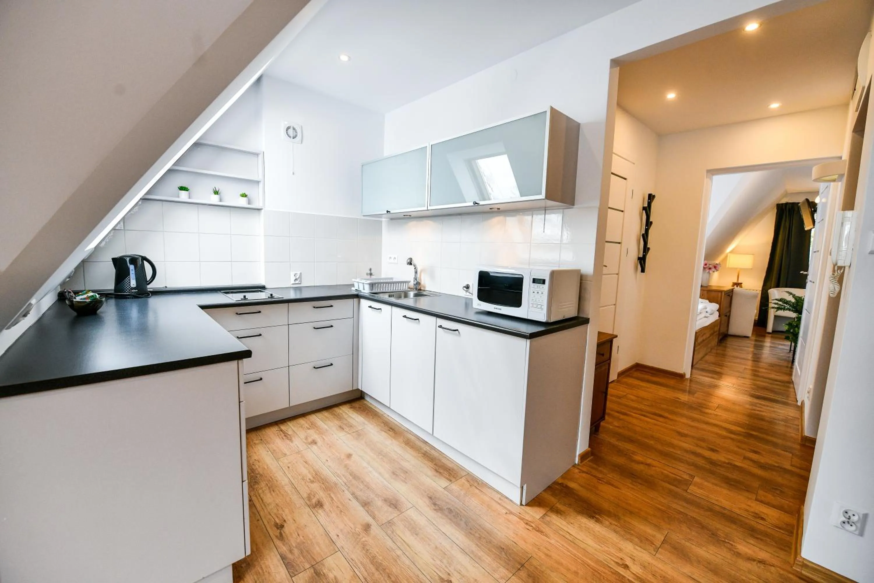 Kitchen or kitchenette in RentPlanet - Apartamenty Bulwary Słowackiego