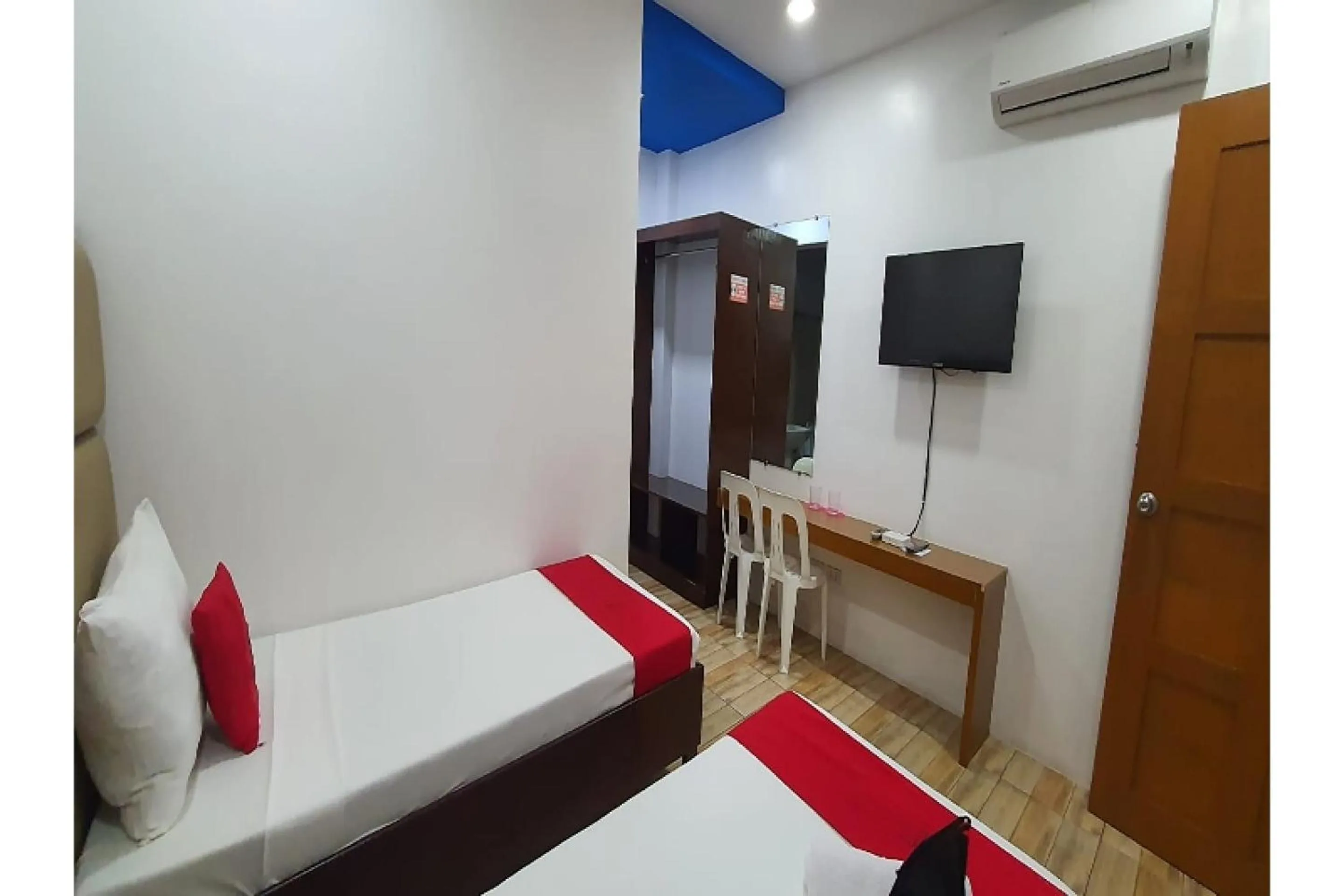 Bedroom in OYO 869 Jnv Dream Hotel