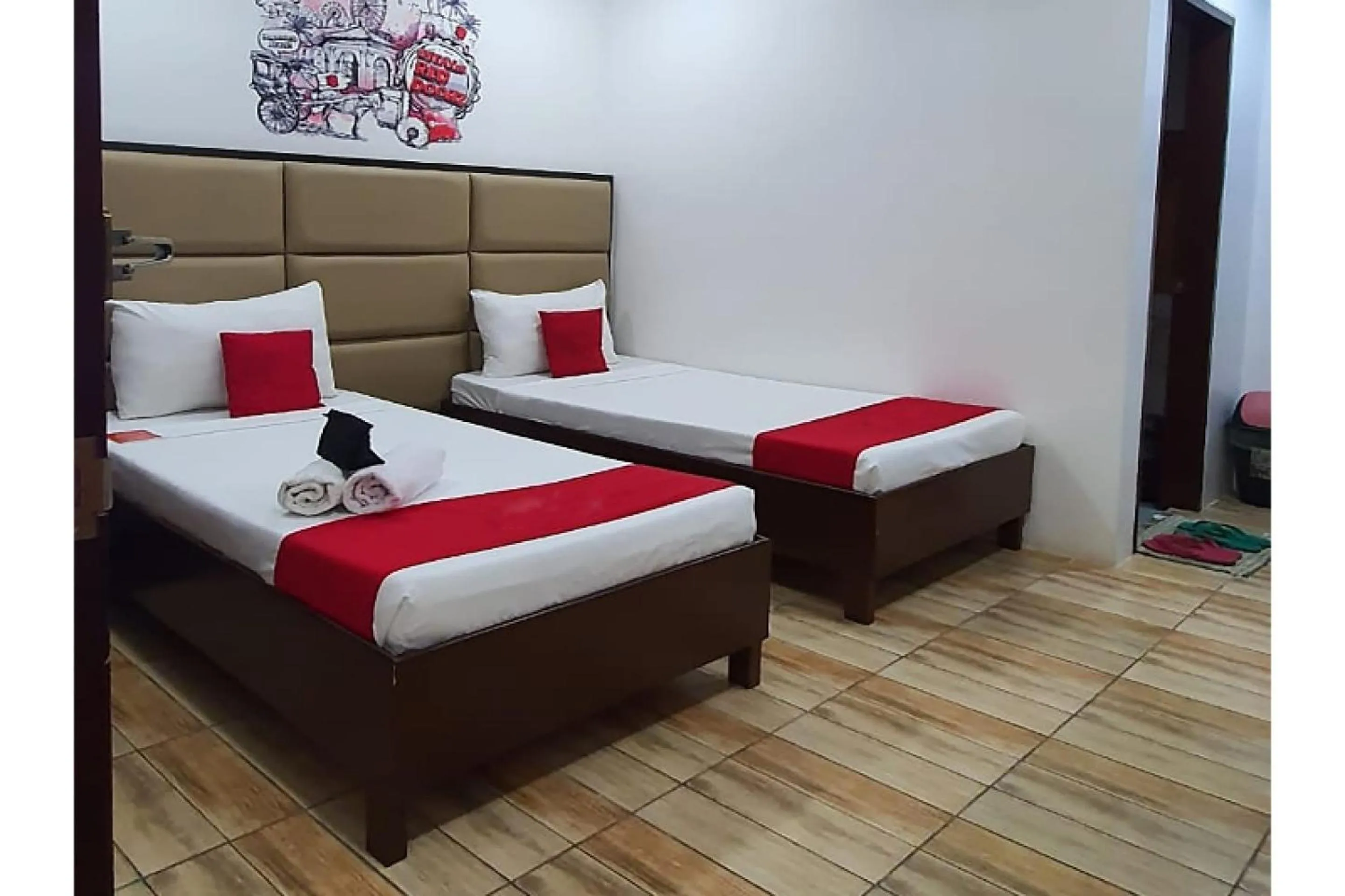 Bedroom in OYO 869 Jnv Dream Hotel
