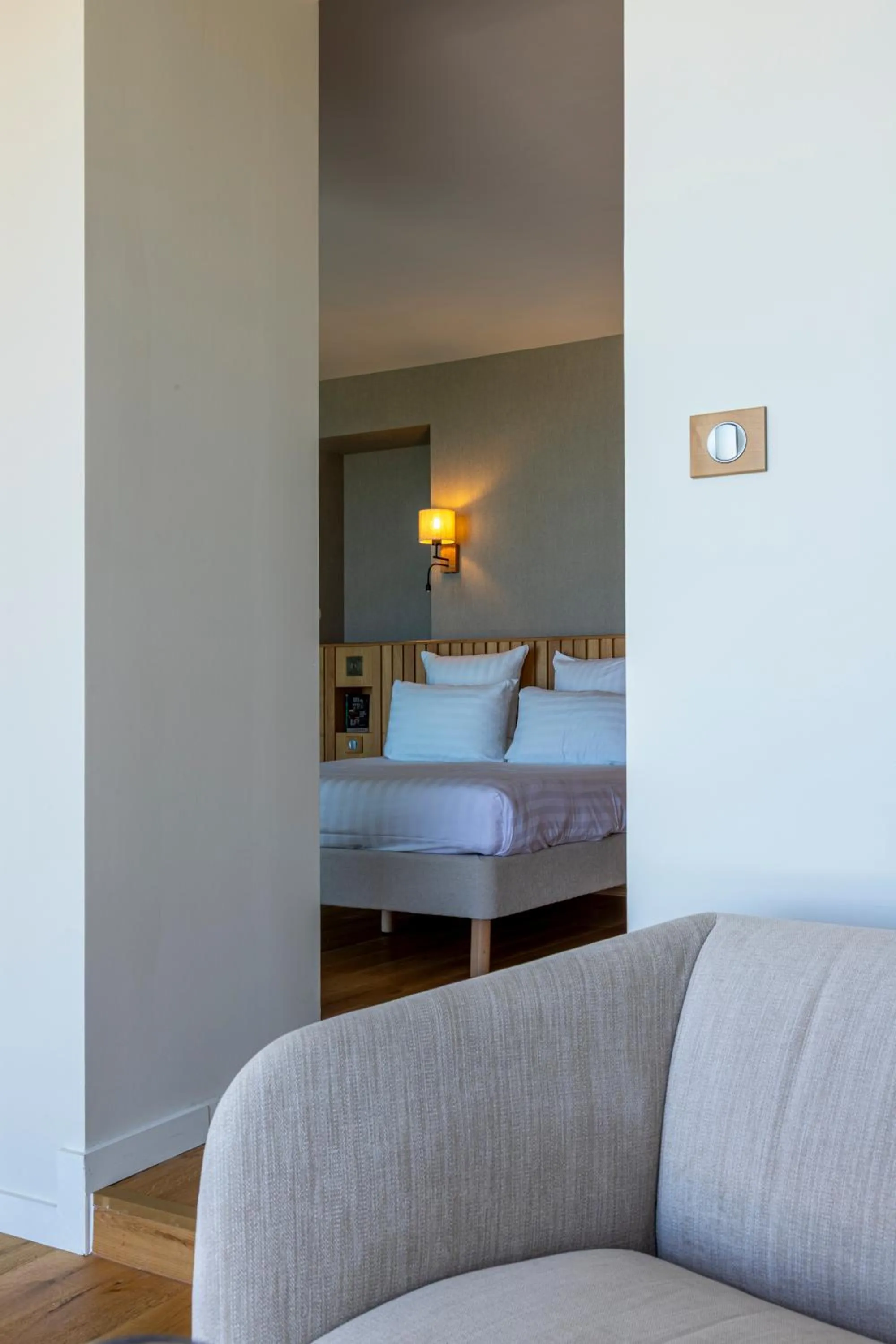 Bed in Logis Hôtel de Carantec