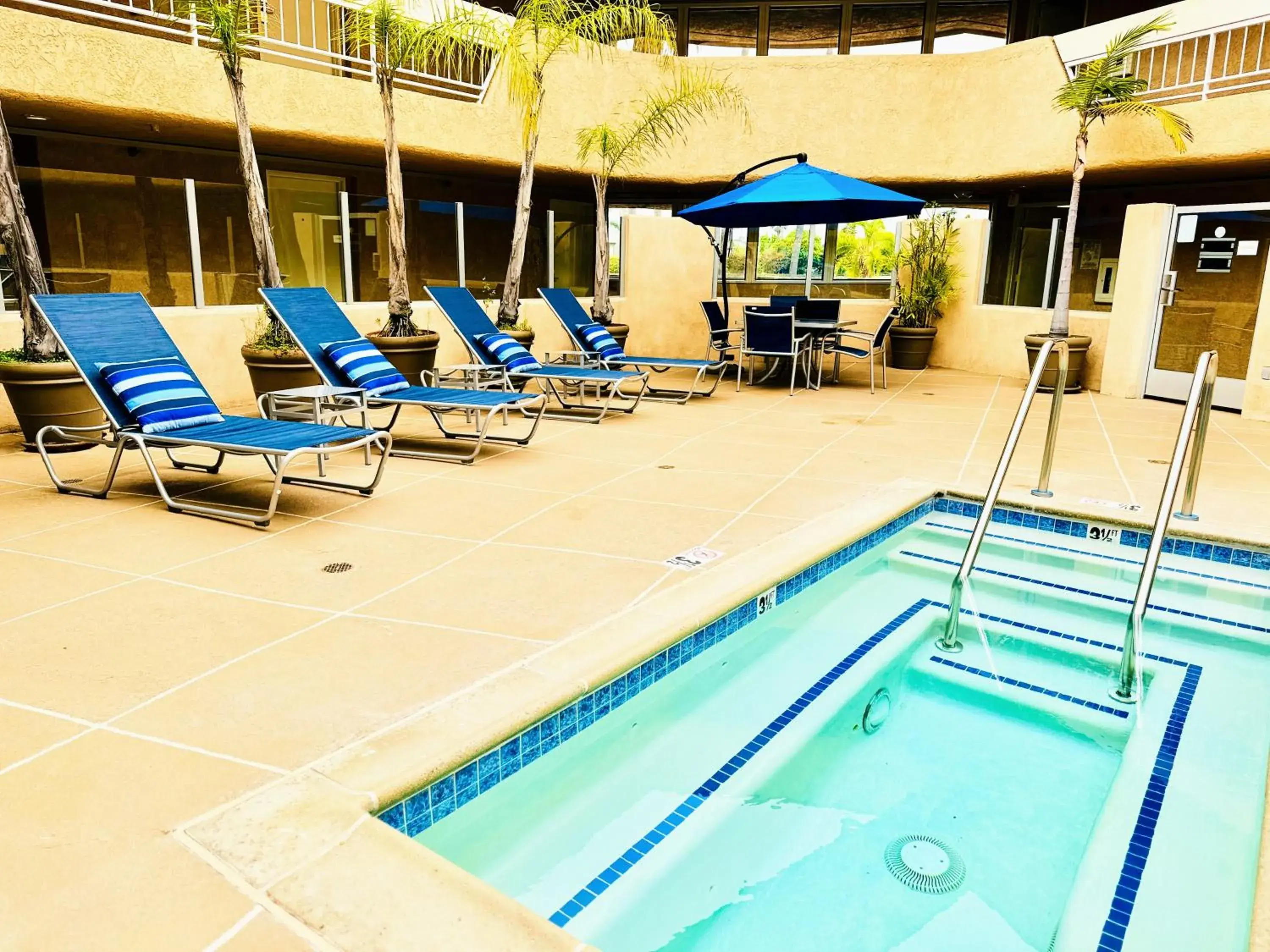 Pool view in The Pacific Inn Pool view in The Pacific Inn