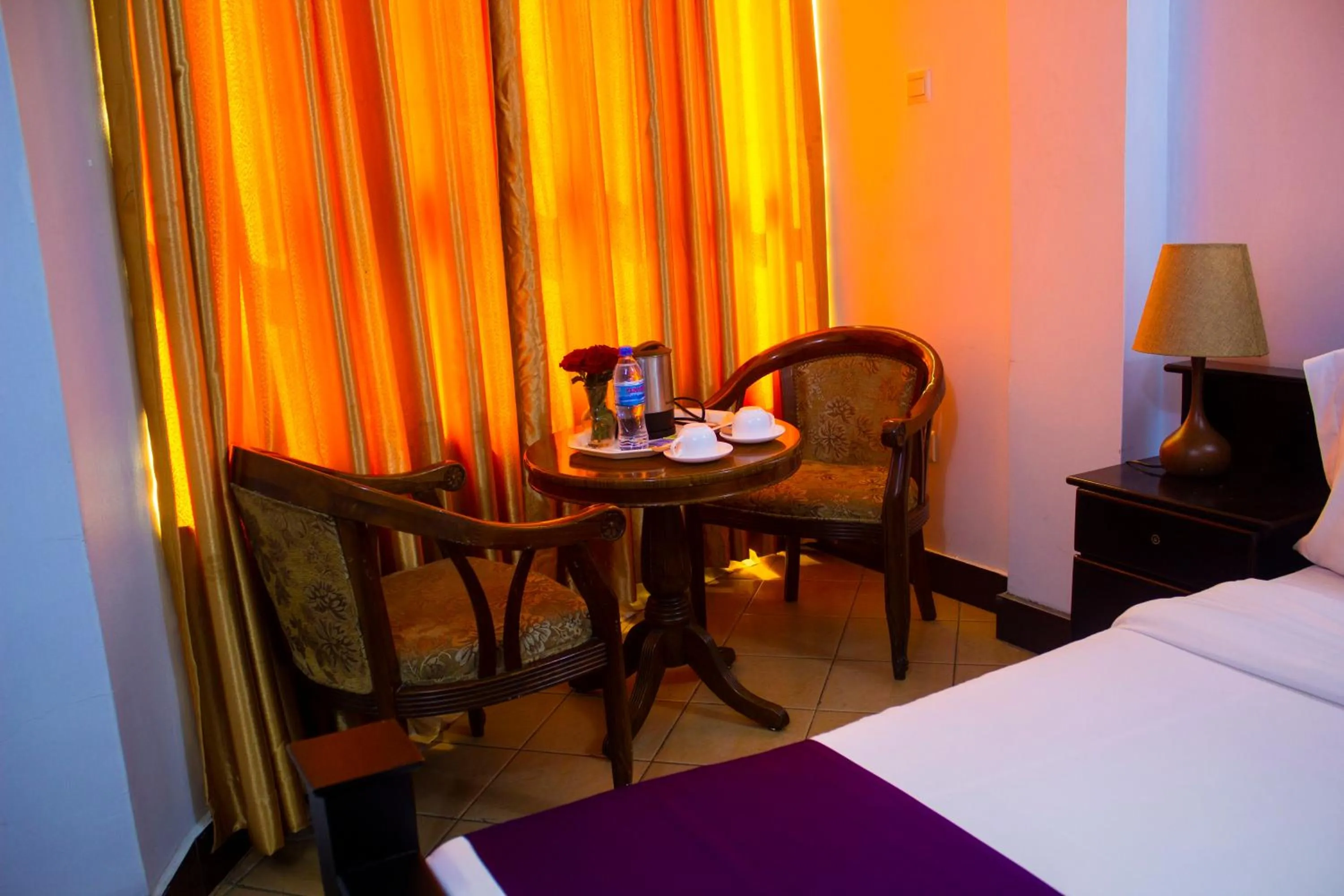 Seating area, Bed in New Hotel Aquiline